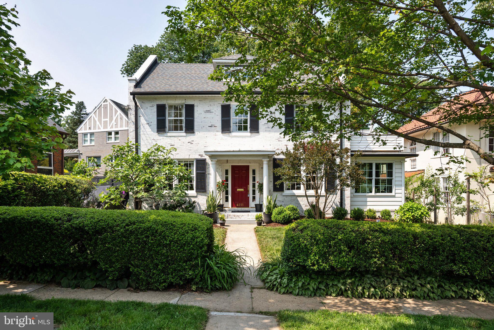 Elevated and elegant, this notable home in the Town of Chevy Chase is thoughtfully designed and beautifully renovated throughout. Brimming with curb appeal with a refined facade and landscaped gardens, this classic five-bedroom / three-and-one-half-bathroom brick Colonial offers the best of both urban and suburban living.
Featuring tasteful details, such as hardwood floors, crown and decorative moldings, wood beams, wide doorways, and gorgeous windows, it allows for an abundance of natural light from all sides.
Guests enter the gracious center-hall foyer, flanked by a formal living room and formal dining room. The living room is anchored by a fireplace with mantel and floor-to-ceiling bookshelves, while the bright adjacent sunroom is functional as an additional living space or home office.
The heart of the home is the chef’s kitchen, highlighted by a center island breakfast bar and high-end appliances. The wood beams and statement light fixtures punctuate the space, with open flow to the family room and door to the back patio and deep backyard, which includes a fire pit -- all perfect for gatherings and entertaining. An updated powder room completes the main level.
The second level boasts the gorgeous primary suite featuring a spacious balcony and a spa-like en suite full bath with dual sinks, and contemporary fixtures and finishes that add a dash of style to your morning routine.
Two additional bedrooms, plus a bright, full bath with a convenient washer/dryer complete this level. The third level is composed of two additional bedrooms, another full bath, and attic storage.
The expansive lower level provides ample room for any need -- use as an additional recreation space, an oversized game room, or future guest suite. There is also garage access, laundry, and ample storage.
4111 Rosemary Street benefits from parks, trails, and neighborhood amenities, offering an ideal balance of a quiet residential street and close urban proximity. This home offers it all, in a picture-perfect package.
The Town of Chevy Chase is a vibrant residential enclave known for its well-maintained streets, architectural charm, and unparalleled convenience. Just north of the D.C. line, this historic community offers immediate access to downtown Bethesda, Friendship Heights, and Connecticut Avenue, with shops, cafes, and local institutions just moments away. The Town is recognized for its active municipal government and strong commitment to preserving quality of life for residents, from infrastructure upkeep to thoughtful zoning. With parks, trails, and neighborhood amenities like Olympia Cafe and La Ferme nearby, the Town of Chevy Chase offers an ideal balance of quiet residential streets and close urban proximity. Chevy Chase Elementary, Silver Creek Middle, and B-CC High School serve the area.