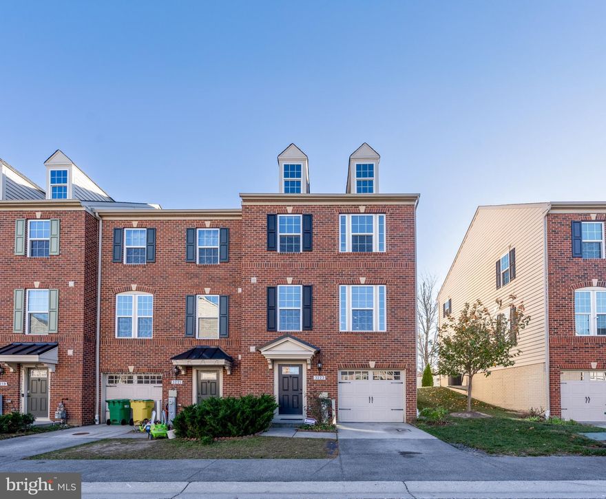 Experience this stunning 3-bedroom, 2.5-bath end-of-group townhome in the sought-after Ellicott Crossing community. Thoughtfully designed with modern features, this home offers the perfect blend of style and functionality. The entry-level welcomes you with access through the 1-car garage or front entrance into a spacious recreational room, pre-wired with speakers to create an ideal space for movie nights or entertaining. The main level features an open-concept layout with 6-foot extension, showcasing a gourmet kitchen with granite countertops, ample cabinetry, and a walk-out to the rear balcony, perfect for relaxing or hosting guests. A convenient half bath adds to the practicality of this floor. Upstairs, the primary suite impresses with elegant tray ceilings, a luxurious en-suite bathroom, and ample natural light. Two additional bedrooms, a full hallway bath, and an included washer and dryer complete the upper level, offering comfort and convenience for the whole household. The HOA maintains common areas and the yard up to the deck, allowing for a low-maintenance lifestyle. This home is move-in ready and waiting for you. Don’t miss the opportunity to make this exceptional property your next home—schedule your showing today!