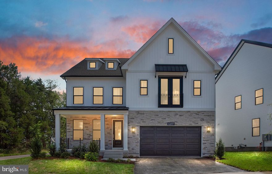 Welcome to the Konni Modern Farmhouse—where luxury, comfort, and style meet in the most spectacular way. Tucked away on a private cul-de-sac with lush, wooded views, this home is designed to impress from the moment you arrive. With 6 bedrooms and 6 full baths, including a main-level guest suite, you’ll have all the space you need for family and entertaining. Inside, soaring hardwood floors lead you into a chef’s dream kitchen with top-of-the-line appliances, custom cabinetry, and an oversized island perfect for gatherings. Upstairs, the primary suite is your own private retreat, featuring a spa-like bath with a free-standing tub and oversized shower. Added windows fill the room with natural light, while the laundry room—complete with a washer, dryer, sink, and ample cabinetry—adds convenience to daily living. The finished lower level is the ultimate hangout spot for movie nights, game days, or hosting friends. Outdoors, enjoy peaceful mornings on your front porch or unwind in the evening on your backyard patio under the stars. This is more than just a home—it’s your forever escape, and it’s ready for you today. Call us today to learn more!