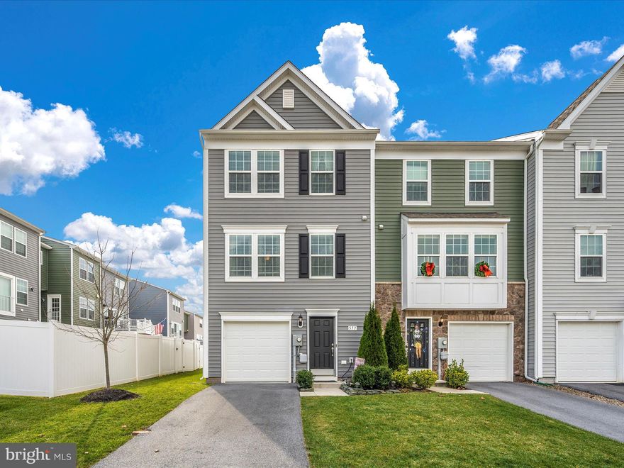 Welcome home to Briar Run! This meticulously maintained end unit townhome is like new without the wait. Enter the home on the main level with a large finished rec room and half bath. The first upper level is your main living space. The kitchen is high end with stainless steel appliances, large island with bar, and ample cabinet and counter space. Two nooks create space for breakfast areas and additional seating. The family room is well sized with large windows for natural light. Enjoy evenings on your expansive rear deck overlooking the completely fenced yard. Three bedrooms on the second upper level with two full baths complete the home. Briar Run is conveniently located to major Commuter routes as well as shopping, grocery, and dining. Set up your showing today!