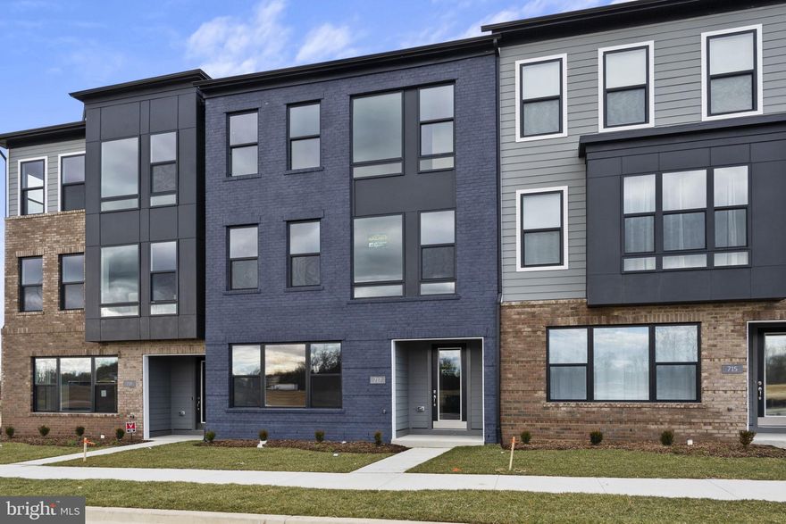 $30,000 TOWARDS CLOSING ASSISTANCE * Subject to the use of one of the builder-approved lenders. Can be used for interest-rate buydowns! Restrictions apply.

Discover affordable luxury with Mid-Atlantic's thoughtfully designed interior unit townhome, featuring a  two-car rear entry garage. This residence strikes the perfect balance between modern functionality and cost-effectiveness, making it an ideal choice for those seeking comfort without compromising on style.

Nestled within the South Lake community, this townhome provides a cozy haven with exclusive amenities, including a community pool, a recreational center, and the convenience of a future grocery store. Enjoy the upcoming retailers like PJ's Coffee, Panera Bread, Sheetz, and more that enhance the vibrancy of this welcoming neighborhood.

Step inside and explore the flexible ground floor layout, offering versatility for your lifestyle. Whether you envision an entertainment space, a casual living area, or a home office, this interior unit townhome provides the flexibility to tailor the space to your needs. The two-car rear entry garage adds practical convenience.

Ascend the staircase to the open first-floor living, dining, and kitchen area, where the thoughtful design maximizes space without compromising on style. Host gatherings with loved ones in this inviting space, perfect for creating lasting memories.

The upper level features two bedrooms, a convenient laundry area, and an efficiently designed owner's suite. This townhome has been crafted to provide the essentials for comfortable living while remaining budget-conscious.

Immerse yourself in the virtual experience through our 3-D panorama tour and video tours, then take the next step toward making this budget-friendly interior unit townhome your own. Contact us now to schedule your visit and discover the perfect blend of affordability and luxury.