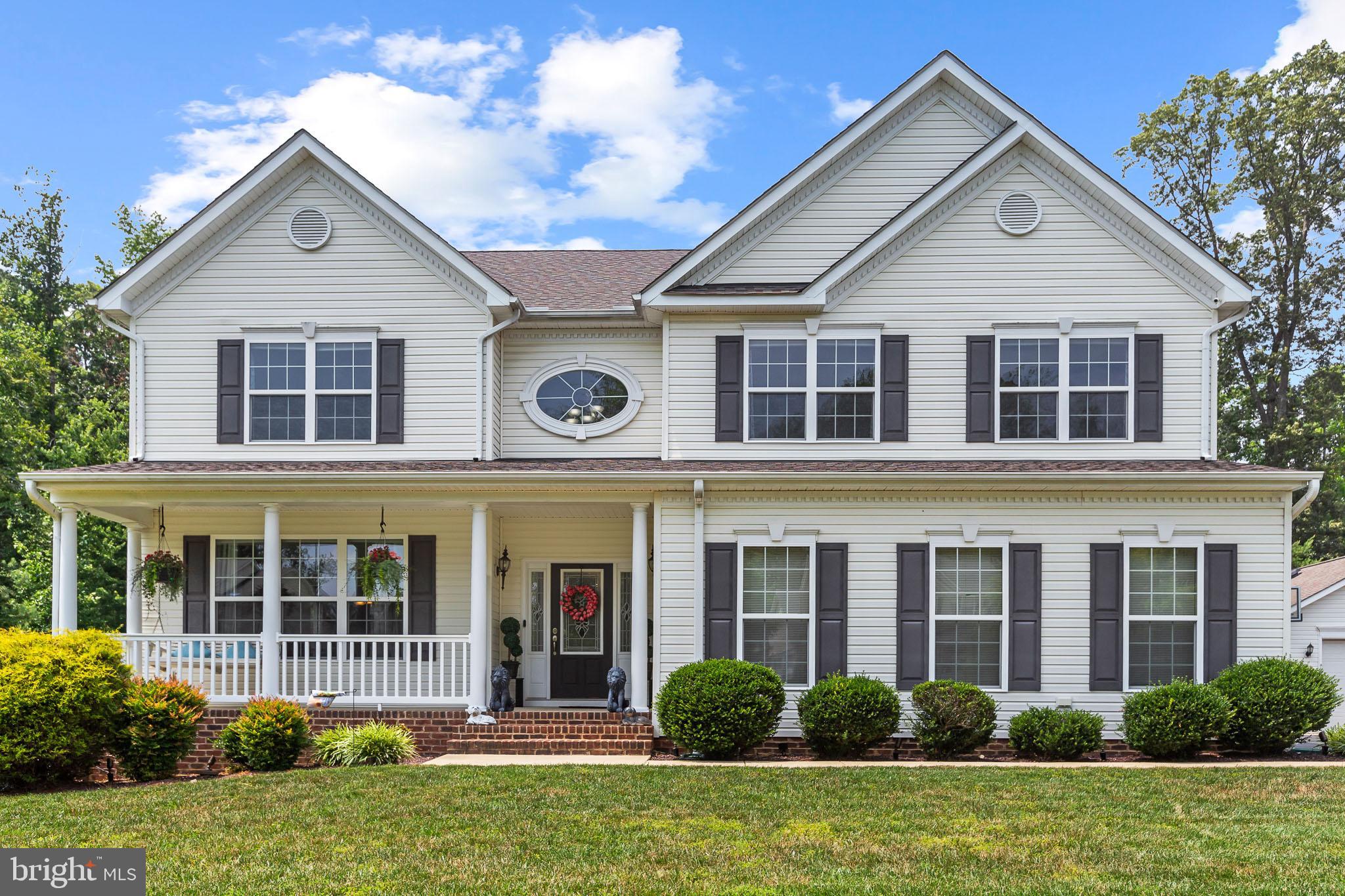 Cool off this hot summer in your new home, a Grandview Haven Colonial featuring an in-ground, low-maintenance saltwater pool ready for you to take a dip! With more than 4500 finished square feet, this 5 bedroom, 3.5 bath, Belmont model has room for everyone! Beautiful Bamboo hardwood flooring greets you in the two-story foyer and continues through the main level. The eat-in kitchen is a chef's delight with granite counters, gas cooktop, double wall ovens, Maple cabinets, stainless appliances and island with breakfast bar. Kitchen is open to the roomy extended family room. Get cozy by the gas fireplace on a chilly night or head out to the back deck to enjoy a nice day under the pergola. Crown molding and wainscot dress up the formal dining room that flows into the formal living room that also makes a great home office. You'll love the oversized 2-car attached garage that'll fit a full-size truck and the 20x30 detached garage with electric, door opener and room for a workshop! Heading upstairs, the wrap around landing leads you to four spacious bedrooms and shared hall bath. The huge primary bedroom includes double walk-in closets and double vanities in the attached bath with a soaking tub and amazing tiled shower with double heads! Heading downstairs, the lower level offers a fifth bedroom that could be used for guests, office or play space and a media room where the screen and projector convey. The exercise room walks out to your private oasis with attractive stamped concrete surrounding the heated saltwater pool with sun shelf! The lower level full bath makes for easy pool access and changing after a swim. Out back, the yard continues past the pool fence to a wooded tree line that provides privacy and room to play. Another bonus, a convenient mudroom/laundry on the main floor, pre-wired surround sound and generator plug-in are finishing touches that make this beauty one that you will not want to miss. Schedule your showing today!