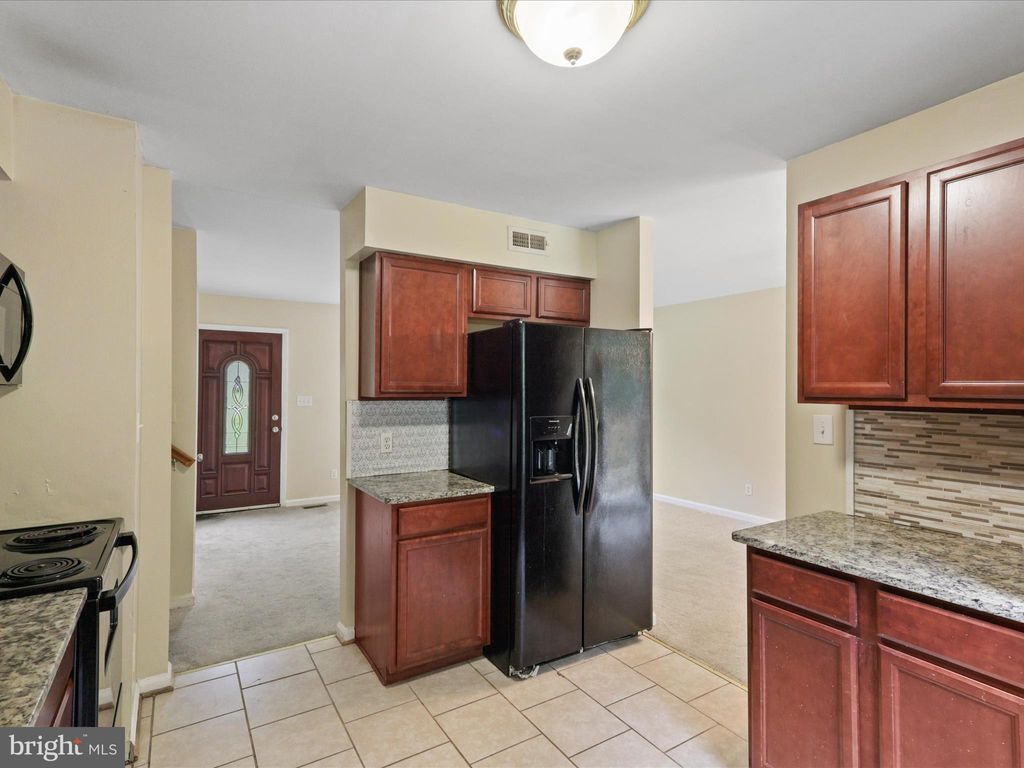 Photo of 10611 Cobblestone Drive, SPOTSYLVANIA, VA 22553 (MLS # VASP2037038)