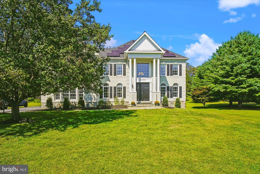 Nestled on a cul de sac  and backing to Conservation land,  this stately, brick 5 BR, 4.5 BA Colonial offers your own private retreat on a 2.7 acre  beautifully serene  lot which can be enjoyed from the new multi level deck complete with hot tub. Step into the grand two-story foyer and be greeted by Palladian accent windows, custom  crown molding, and a gracefully curved central staircase. The main level  includes a formal dining room with butler's pantry, a bright elegant living room, a private office, powder room, and a  family room with  a cozy gas fireplace framed by a charming brick accent surround.  The heart of the home is the updated gourmet kitchen with new LVP tile floors, abundant  white cabinets, granite counter tops, stainless steel appliances,  large walk-in pantry and a massive center island for casual dining and conversation.   Retreat to the spacious  owner’s suite with cathedral ceilings, a sitting room, two sided gas fireplace and the spa-inspired bath featuring a freestanding soaking tub, designer shower, dual vanities, and custom tile finishes. A His & Her walk-in closet with built-in organizers complete the suite. Three additional bedrooms, two full en-suite baths, and a convenient laundry room with new front loading  washer/dryer round out the upper level. The fully finished, walk-out lower level offers an expansive recreation room with built in theater speakers, a fifth bedroom, a full bath, and a workout room/gym and ample storage space.  The many updates include Roof (2019), new hot water heater , new Deck(2025), Solar panels (2020), refinished hardwood floors, new hardwood floors in family room, new carpet, fresh paint throughout, level 2 EV Charger-Ford Charge station pro and so much more.  A prime Location for commuters, you are just 20 miles north of Washington, DC, with easy access to Route 200 (ICC), New Hampshire Ave, Georgia Ave. and minutes to Olney Village.  Available VA Assumable Loan at 2.25% for qualified buyers.