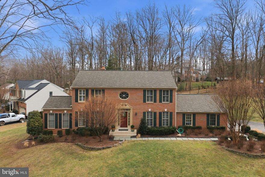*Open House Saturday Feb 7, 1-3pm. Spectacularly upgraded and a must-see, this center-hall colonial is located in the desirable Fox Station community of Fairfax Station and sits on just over three-quarters of an acre with mature landscaping that provides both privacy and a park-like setting. The home features a covered, screened rear deck ideal for outdoor living and entertaining. Inside, the residence has been thoughtfully updated with a renovated kitchen and baths, new carpet in all four bedrooms, and hardwood flooring on both the main and upper levels. Additional interior improvements include first-floor window blinds and a skylight screen.

The kitchen offers updated appliances, while major system upgrades include a high-efficiency condensing furnace and air conditioning system, along with an HVAC humidifier and UV lamp and a  Generac home, generator.   Exterior and functional enhancements include roof replaced in 2018, wrapped wood trim, rake and corner boards, landscape lighting, an updated garage door, LeafFilter system and gutters, effluent pumps, washer and dryer, and a cast iron fireplace.

The home also includes a fully finished basement with a full bath and flex room, offering flexible additional living space. Conveniently located near shopping, dining, and everyday amenities, this property combines classic colonial design with extensive modern updates and is ready for its next owner. Photos may be virtually staged.