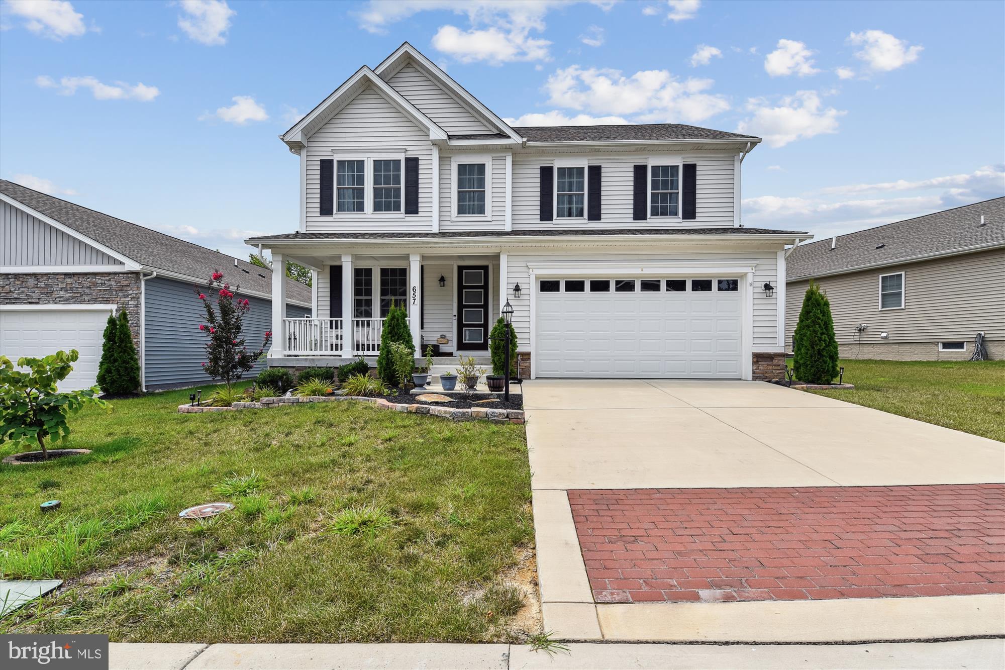 Beautiful home in sought after Bulle Rock community. This lovely home has so many features including an inviting front porch, main level private office, gourmet kitchen with a massive island and upscale pendant lights, pantry, breakfast/sun room, gas fireplace and high ceilings. When you head upstairs you find a second larger living area which could be used as another family room, homework station, home office or more. All four spacious bedrooms upstairs feature ceiling fans and most have built-in closet systems. There is a separate laundry room with storage. Both bathrooms have dual sinks and the primary features a soaking tub. The lower level is partially finished with a large rec room with high ceilings throughout. The unfinished area has rough ins for plumbing to add a bathroom as well as an upgraded egress window if you wanted to add a fifth bedroom. You will find plenty of extra touches through the home including the smart thermostat, rod iron spindles, upgraded lighting and even an electronic car charger in the garage. Don't wait to make this turnkey property your next home. Resort style living. Best deal in Bulle Rock!