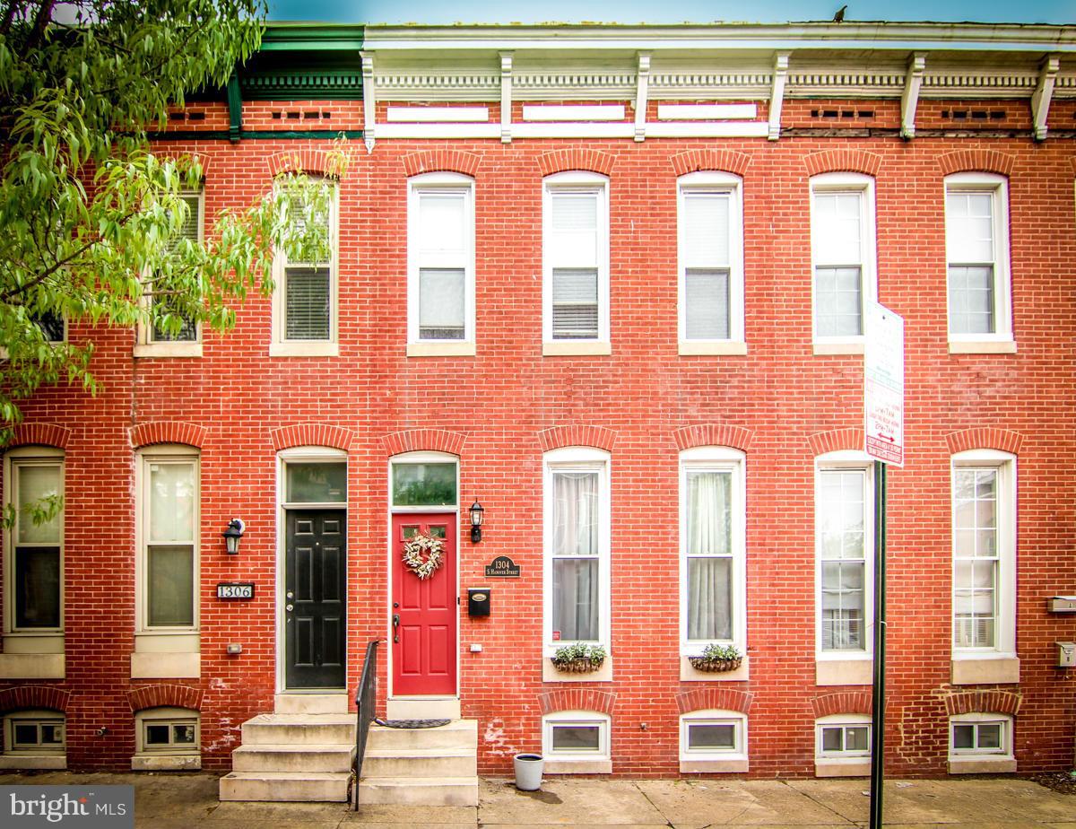 Incredible town home back on the market! 3 bedrooms, 2 baths, original hardwoods, recessed lighting, exposed brick, crown moldings, wood burning fireplace, and more, Enjoy entertaining on your fenced in patio or your rooftop deck. 2 CAR PARKING! Tenant occupied until July 1.