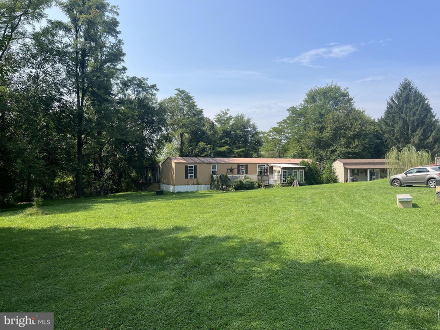 Discover the tranquility of rural living at 4837 Clermont Mill Road in Pylesville. Nestled on a sprawling 4.77-acre parcel zoned for agriculture, this property offers endless possibilities for farming, homesteading, or simply enjoying the great outdoors. A picturesque pond graces the landscape, providing a serene spot for relaxation and reflection.

The absence of a homeowners association (HOA) means you have the freedom to use your property as you see fit. This peaceful retreat is just a short drive from the natural beauty of Kilgore Falls and Rock State Park, making it perfect for nature lovers and outdoor enthusiasts.

Experience the charm of country living with the convenience of nearby amenities. Whether you dream of cultivating your own garden, raising animals, or simply soaking in the quiet, this property is a rare find. Don't miss the opportunity to make 4837 Clermont Mill Road your own personal haven.

Buyer to do due diligence and verify all uses and zoning through Harford county. 

Currently has mobile home on property that will stay, as is