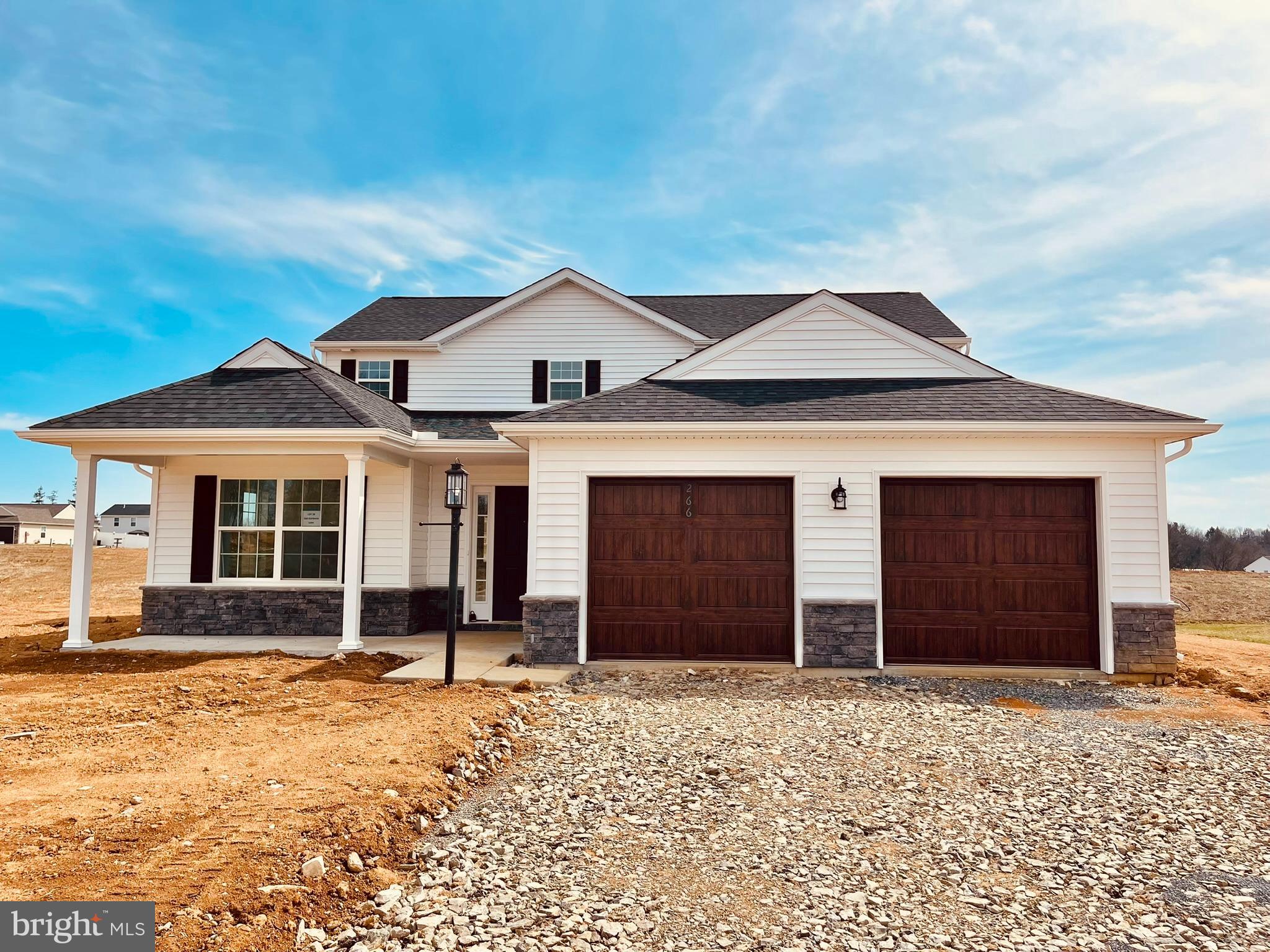 This is our Poplar model features open floor plan, 4 bedrooms, 3 full bathrooms and a half bathroom. Two primary bedrooms one on main level with attached bathroom and walk in closet. Designer kitchen large center island, maple wood cabinets, stainless steel sink, recessed and pendant lighting and expanded walk in pantry. Upgraded Luxury Vinyl Plank flooring throughout main level. Bonus Sunroom addition added gorgeous large windows and vaulted ceiling. Main level also includes den/office area, half bathroom and mudroom/Laundry room leads to garage. Second level features a 2nd primary bedroom with walk in closet and attached bathroom, plus 2 additional bedrooms and 2 full bathrooms. ALL PHOTOS OF SIMIALR HOME. UPGRADES include-10x12 sunroom, expanded pantry, man door in garage, EVP flooring, lot premium, gas fireplace