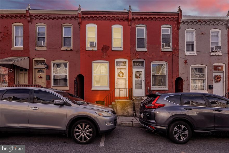 Welcome to this well-maintained brick row home located in the heart of Reading offering 2 bedrooms, 1 full bathroom, and approximately 932 square feet. The main level features a bright and inviting living room with neutral paint tones and updated flooring, creating a warm and welcoming atmosphere. An arched doorway leads into a designated dining area, ideal for everyday meals or entertaining. The kitchen offers solid wood cabinetry, ample counter space, and natural light, with direct access to the rear of the home. Upstairs, you’ll find two nicely sized bedrooms with continued neutral finishes and a full bathroom. The layout is efficient and functional, making great use of the available space. The exterior showcases traditional brick construction, consistent with the character of the neighborhood. Out back, enjoy a quaint fenced rear yard, perfect for outdoor seating, storage, or gardening. Conveniently located near local shops, schools, and public transportation, this property is well-suited for first-time buyers, downsizers, or investors looking for a solid opportunity.