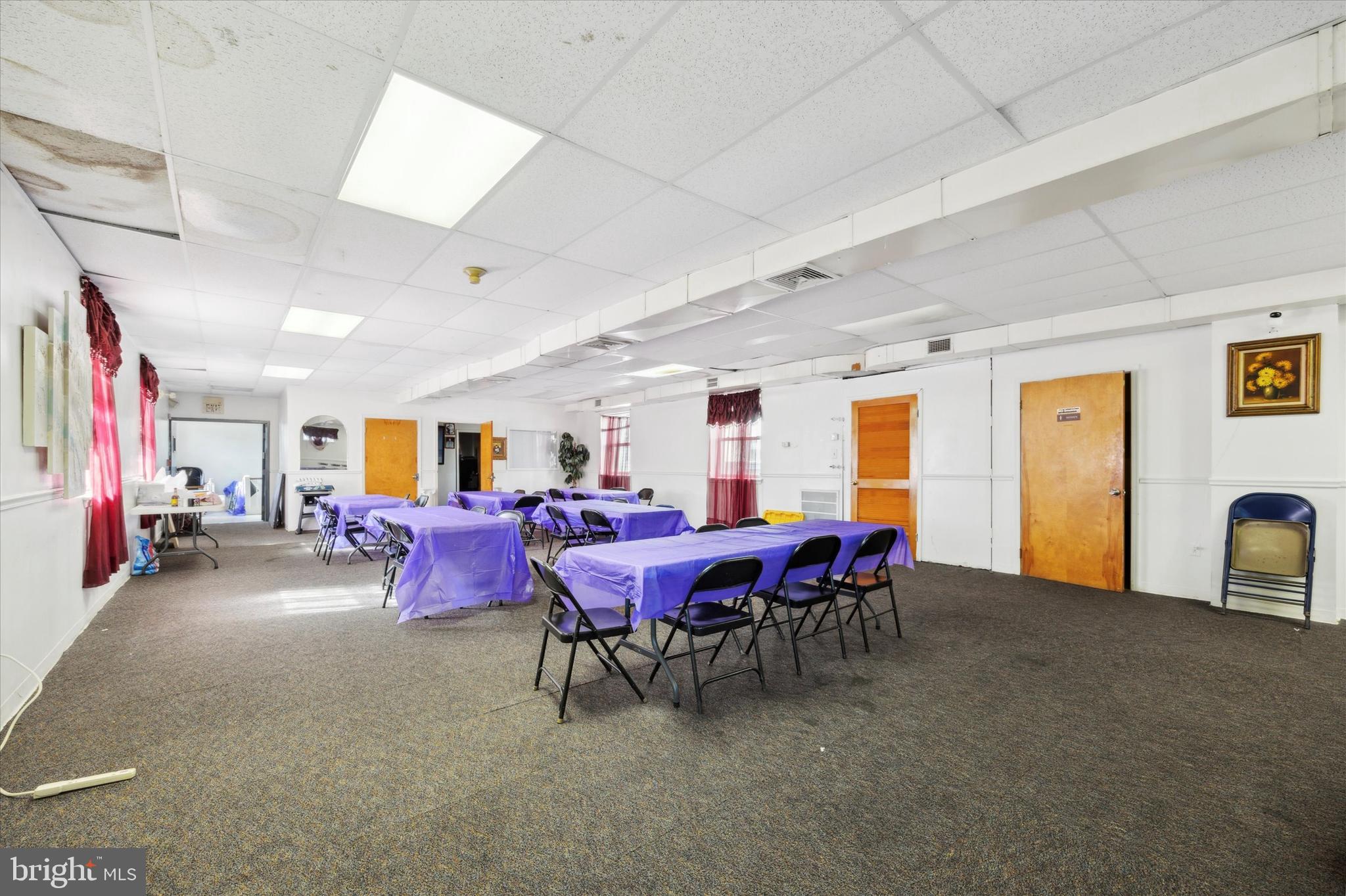 Opportunity awaits the creative investor or owner occupant looking for a large building with many possibilities. Zoned RSA5 & currently occupied as a church and gathering center. There is over 6,000 square feet of 2 large open floors with separate entrances for each level and separate bathrooms as well. There is a huge kitchen in the rear that can be accessed separately as well from each floor. The first floor has multiple office spaces and a large altar/stage with a sound room. The second floor is wide open with a large 2 room office area. The property has off-street parking for 6 cars and a gate to lock for overnight storage. There is a huge basement, unfinished, but great for storage. Separate HVAC units for each floor and camera system for the whole building. This property would be great to continue as a church or has potential for many uses. Take a look at it today!