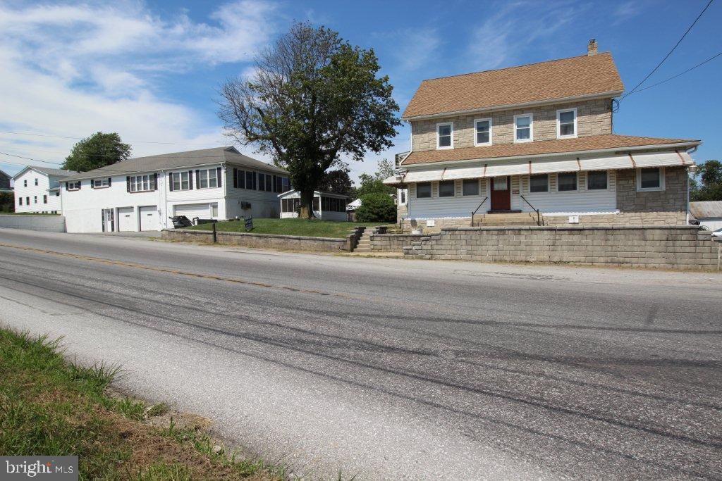 Own a piece of history! Includes a large raised ranch over a 4 car garage PLUS the former Nine Points Store which houses a very large 2nd floor apt. Separate well and septic. 15x11'3'' screened gazebo and so much more! Buyer to verify usage with township. Motivated seller. Selling property ''as is'' Refer to MLS#239738 for Former Nine Points Store information. <marquee behavior=''scroll'' direction=''left''>OWNER SAYS "MAKE AN OFFER!"</marquee>