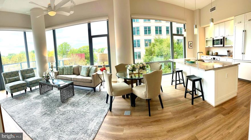 INCREDIBLE PRICE. This is a one of a kind.  It is the ONLY 1 bedroom  + queen sized den unit that sits on the coveted SW corner. It also has a large balcony which offers incredible saturating natural light which is more vibrant in person.  Offering soothing views over the trees, an oversized balcony, and floor to ceiling windows, this one is not to be beat.  In the heart of downtown Bethesda, The Cheval offers the highest luxury lifestyle with a 24 hour desk attendant, elegant lobby and greeting room, a well appointed gym, and a substantial rooftop terrace offering incredible views and multiple well appointed areas for entertaining.  The unit has rare high ceilings, immense windows with custom automatic blinds, fresh appliances, elegant finishes and, as a bonus, your parking space (406) is just feet away from your front door.  This price point for this floorplan and this view is unmatched for a luxury condominium in Bethesda.  Do not hesitate as this one shouldn't last long.