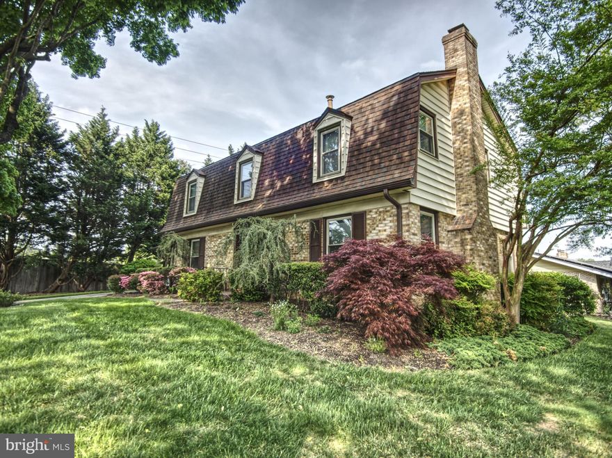 Welcome to this turnkey Fairview Estates center hall colonial offering. Situated on a large corner lot, the home boast wonderful curb appeal and a just completed, top-to-bottom, interior renovation. 
Main level: Large, front-to-back, family room with brick fireplace, recessed lighting, gleaming oak flooring and three exposures.  Formal dining room and a brand new expansive gourmet kitchen.  Quality LG stainless appliances, beautiful quartz counter tops, Porcelain flooring and plentiful natural and overhead lighting,  Guest's bath just off the main foyer. All bathrooms include Toto  toilets.  Upper level: 4 large bedrooms, 2 full baths.  Owner’s en suite bath with dressing area and large walk-in closet.  Nice size hall bath and three other bedrooms.  All with gleaming oak floors and ample closet space.  The lower level is spotless and includes a walk-up exit, washer and dryer as well as a professional dark room!  The lower level provides lots of versatility.  Plentiful overhead lighting and power outlets. This lovely home is truly a rare find, lovingly cared for over the years by the original owner and now nicely updated.  Quality Bryan HVAC system with humidifier.  Newer hot water heater, even a whole house Generac generator! The front yard boasts professional landscaping. Minutes to White Oak shops, restaurants, indoor/outdoor swim center, short distance to parks, trails and mere minutes to ICC and so much more! Fabulous community. Hurry! Priced to sell fast.
