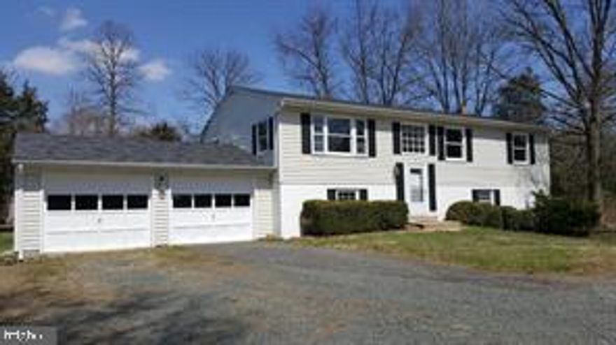 NO HOA   Beautiful  large private yard in country setting. Detached oversized 2 car garage  10 acre homesite High speed internet available at properly. 4 Bedrooms , 3 Baths, Split Foyer with hardwood  floors, attached 2 car garage, circular driveway. Large unfinished utility room with hook-up for W/D. Only minutes to Rt. 15, I-66 & Rt. 29.