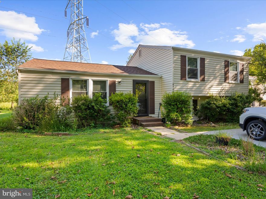 Tucked away at the end of a peaceful cul-de-sac, 6589 Robin Song in Columbia’s sought-after Village of Owen Brown offers the perfect blend of privacy, comfort, and modern updates. Designed with large, open spaces ideal for gatherings, this home welcomes you with a bright and spacious living room that flows seamlessly into the formal dining area—perfect for entertaining. A sun-filled sunroom with vaulted ceilings, a pellet stove, and updated lighting provides a cozy yet airy retreat to enjoy year-round. Much of the home features newly installed luxury vinyl plank flooring, while the bedrooms are finished with plush new carpeting for added comfort. The updated kitchen is a delight, showcasing quartz countertops, a stylish tile backsplash, stainless steel appliances, and plenty of natural light.
The upper level hosts a primary bedroom with a walk-in closet and direct access to a beautifully updated bathroom shared with two additional bedrooms. Just steps from the kitchen and living room, you’ll find a separate family room—an ideal space for movie nights or game days—along with a second full bathroom and a generous utility/storage room. Recent updates include an architectural shingle roof (2021), vinyl-clad windows (2018), HVAC system (2020), front-load washer and dryer (2020), electric range (2023), and renovated bathrooms (2024), ensuring peace of mind for years to come. Outside your door, enjoy all that Columbia has to offer—walking trails, lakes, playgrounds, and community amenities—while being just minutes from shopping, dining, and major commuter routes for easy access to surrounding cities. This is a beautifully maintained home in a prime location, ready for you to move right in and enjoy.