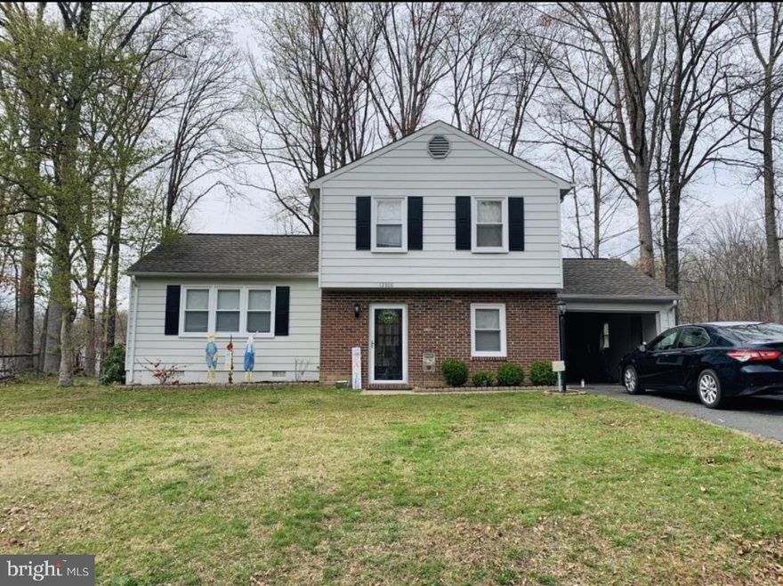 Completely updated and ready for new owners! Newer kitchen with stainless steel appliances, granite counters, and tile floors. Newer flooring throughout,newer windows,light fixtures and asphalt driveway.  Attached garage. Wood burning, brick fireplace in family room.