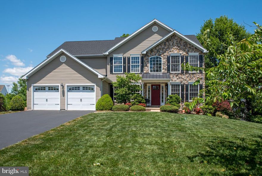 This beautifully updated & meticulously maintained home is situated on a premium lot in Wiltshire at Oxford in pituresque East Nottingham Township.  Enter from the quaint front porch into the grand 2-story foyer, which is situated between the living room w/wall of windows that provide an abundance of natural light (and the 3M film on the windows can help lower energy costs and reduce glare, all while protecting the floors & furnishings), and the formal dining room w/crown molding & chair rail.  Follow the gleaming refinished hardwood floors to the recently updated kitchen w/massive island with additional seating, stainless steel appliances, granite countertops, convection oven & Advantium microwave oven, wine/beverage fridge, tile backsplash, 5 burner gas cooktop w/pot filler, recessed & pendant lighting, and casual dining area.  The slider door leads to the low maintenance & extremely durable Ipe deck with pergola w/privacy & shade curtains.  The deck & fenced-in yard w/lush professional landscaping & charming playhouse w/electric, overlook mature trees which help to provide the privacy & serenity that most are hoping for.  Back inside, the kitchen is open to the cozy family room w/gas fireplace with blower for those cold winter nights, crown molding & recessed lights.  Just beyond the family room is the office w/french doors, hw floors, and a fantastic view of the backyard.  The laundry room w/roll in shower & utility sink, powder room, and 2-car garage complete the 1st floor.  The 2nd floor features a sizable primary bedroom w/walk-in closet & built-in shelves, and the en-suite bathroom w/soaking tub, stall shower, water closet, dual sink vanity, tile flooring & closet.  Three additional bedrooms w/more than ample closet space (two of which are currently set up as desk/vanity nooks), and the hall bathroom w/large vanity for extra storage, dual sinks, tub/shower combination & tile flooring, complete the 2nd floor.  For those who may want to add additional entertaining/casual space, the walk-out daylight basement w/rough-in for bathroom is an open canvas & there’s plenty of storage space too.  The slider door leads to a cozy patio & the amazing backyard.  Additional upgrades & improvements include: new roof (2024), driveway seal coated (2024), kitchen updated (2021), hardwood in 2nd floor hallway (2021), fence (2021), newer front porch w/new posts, garage doors, shutters, professional landscaping, some rooms recently painted & more.  Conveniently located close to major routes, numerous restaurants, shopping, schools, parks, and so much more.  Don’t wait, schedule a showing today!