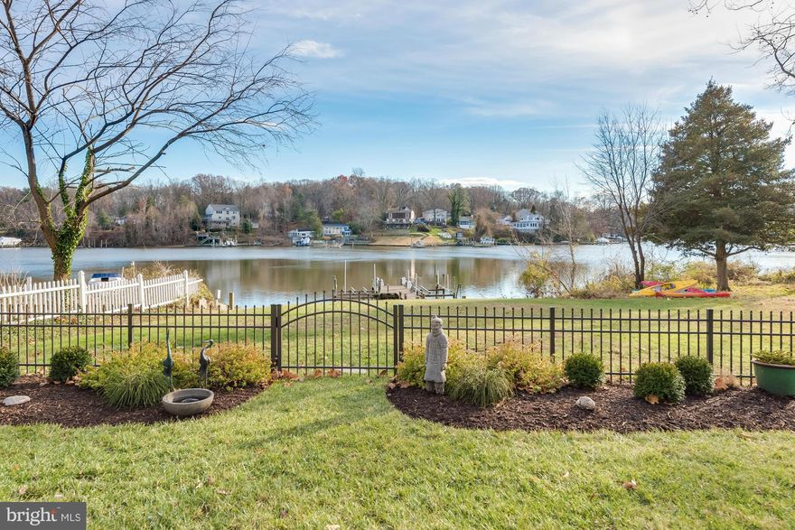 This is a dream home full of waterfront pleasures.Gentle lawn to your private Pier with 2 boat lifts.Inviting kitchen open to comfortable great room. Pella doors and windows captures warm afternoon sun with built in blinds.Privately sited with a front row view on Bodkin Creek. Soaring cathedral ceilings in Master Bedroom suite with deck.Spacious, comfortable and finely finished.Fenced yard