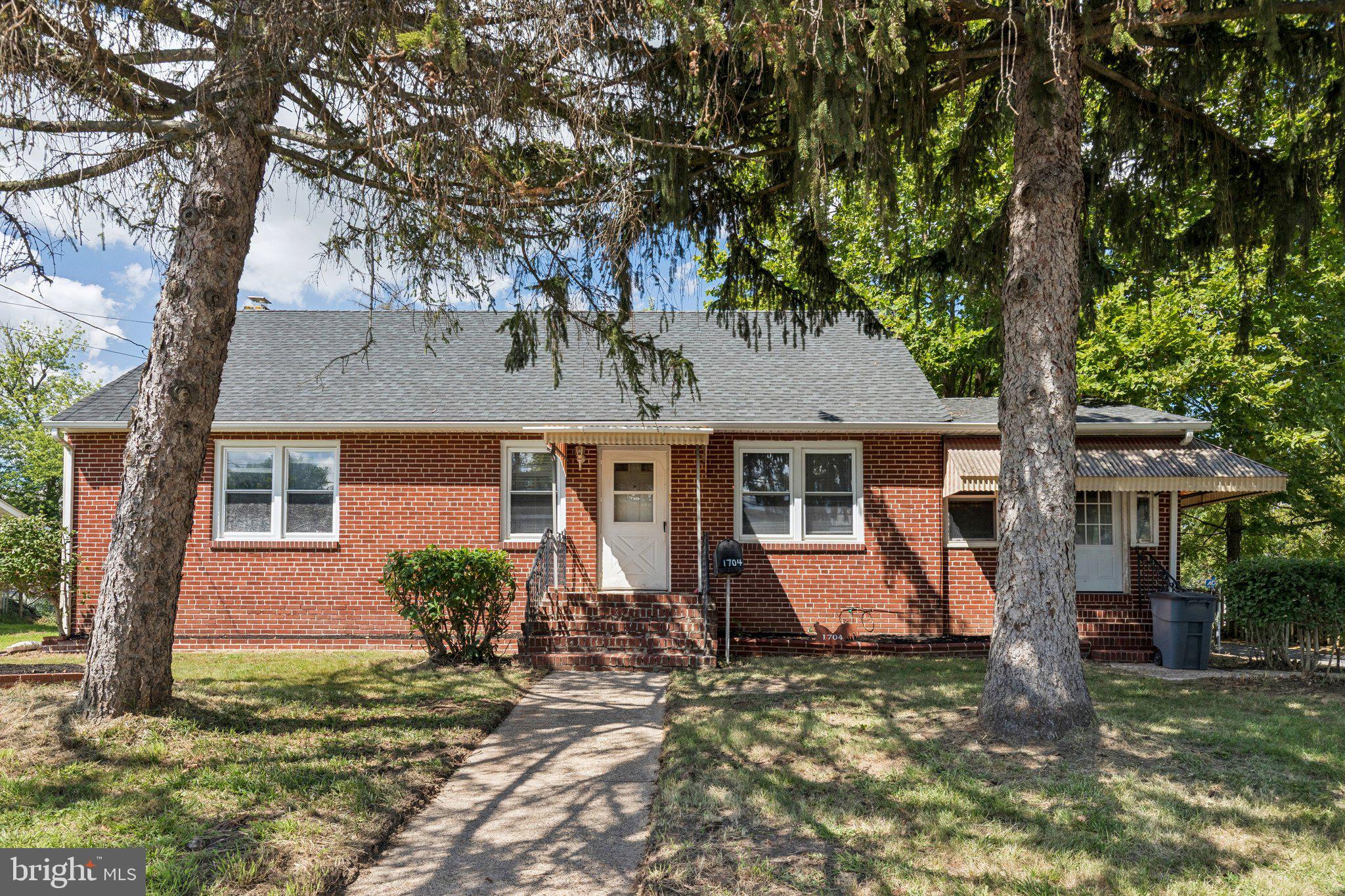 Welcome to 1704 Meetinghouse Road in Upper Chichester! Located in the desirable Namaans Creek neighborhood, this charming Cape Cod with central air & hardwood floors offers 4 bedrooms, 2 full bathrooms, and a flexible floor plan.
Step inside to find a spacious living room that flows into the sizable kitchen with space for a second formal dining area. Just off the dining area, you’ll find an enclosed sunroom surrounded by windows creating the perfect spot to relax or enjoy additional living space. The main level also features two comfortable bedrooms, two full bathrooms, and a convenient mudroom with laundry area.
Upstairs, you’ll find two versatile rooms that can serve as bedrooms, a home office, or extra storage to fit your needs. The unfinished basement provides plenty of storage space with the potential to be finished into even more living area.
Outside, a covered patio overlooks the shaded backyard on almost half an acre that’s lined with pear, blueberry and fig trees. A detached garage with a covered carport & one-car bay adds both storage and parking convenience. There are 3 additional storage sheds behind the garage.
Centrally located & within walking distance to local restaurants & coffee, and just minutes from I-95, this home offers easy access to Philadelphia and Delaware. The home is less than 5 minutes from the local middle & high school. Don’t miss the opportunity to make this home yours!