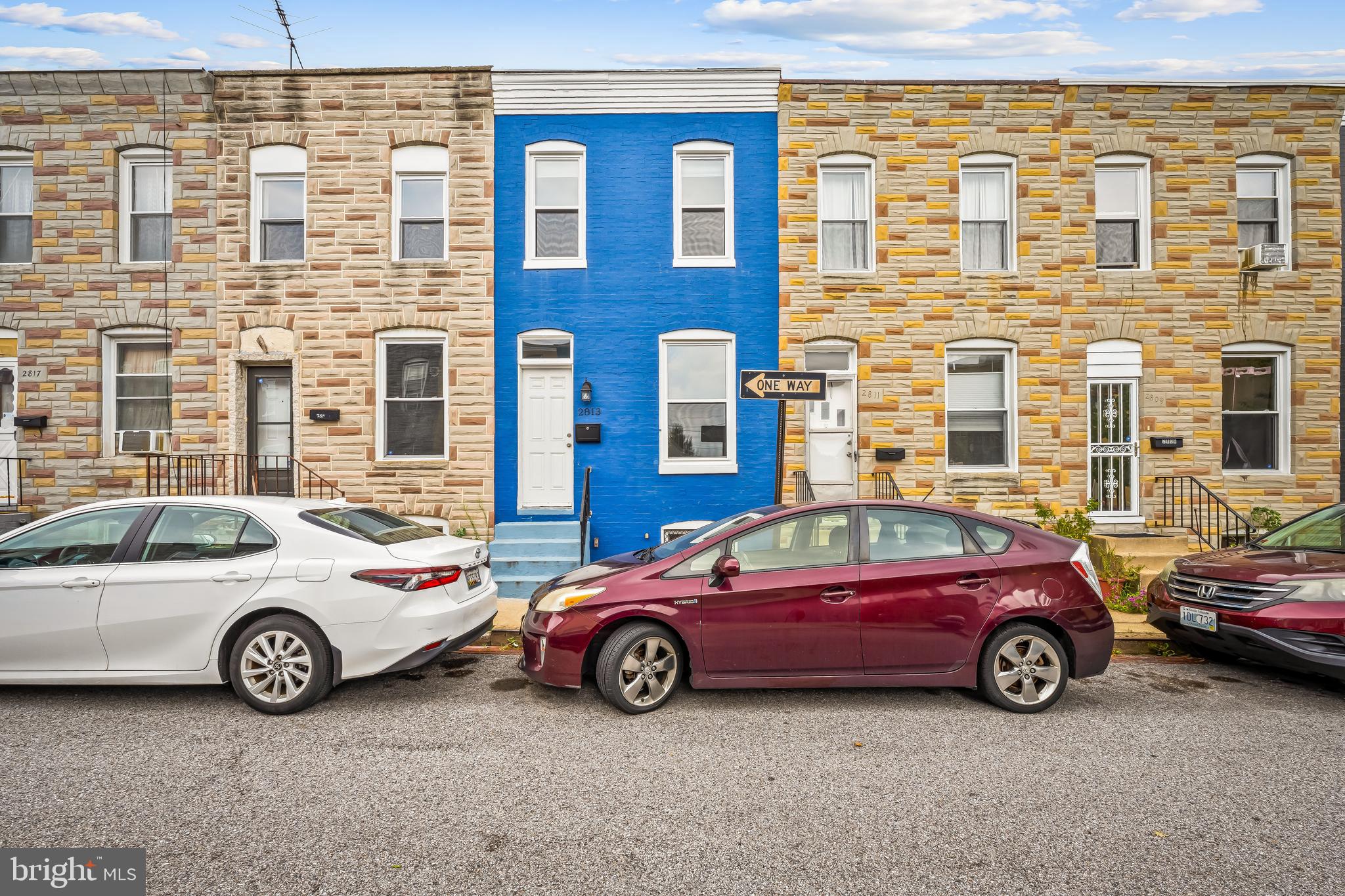 Welcome to 2813 Miles Avenue, a stylishly renovated rowhome on one of Remington’s most neighborly blocks. Fully renovated in 2019, this move-in ready home combines charm, comfort, and location in one unbeatable package.
The main level features a bright living room and a sleek kitchen with direct access to a shady backyard—complete with a mature tree and room to relax, garden, or entertain. Upstairs you’ll find two bedrooms (one a walk-through) and a full bath with timeless white subway tile. The unfinished basement includes laundry and ample storage space.
Step outside and discover one of Baltimore’s most creative and dynamic neighborhoods. Grab a coffee at Café Los Sueños, browse new reads at Greedy Reads, or pick out a plant at B.Willow. Take a stroll past vibrant murals—including the iconic alligator by John Ellsberry—and find peace under the trees at Wyman Park Dell and Harriet Tubman Grove. Hungry? Head to R. House for globally inspired bites from Baltimore chefs, or try local hotspots like Clavel, W.C. Harlan, and the legendary Papermoon Diner.
Live your best Baltimore life in a neighborhood filled with art, food, music, community—and a whole lot of character.