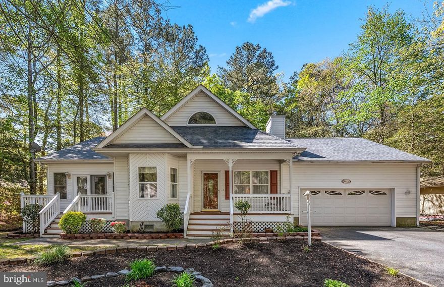 Remarkably maintained 3 bedroom 3 bath South Gate home with great open floor plan, cozy den, primary and guest bedroom on the first floor, and third bedroom set up as a separate suite, with private entrance from the 2 car garage.  Hardwood floors throughout the main living areas, gas fireplace, cathedral ceiling, large laundry room, screened porch, and second floor loft which could serve as a fourth bedroom/office, with additional storage area.  Freshly power washed and ready to move in  and enjoy.  Make an appointment to see this gem today!!!