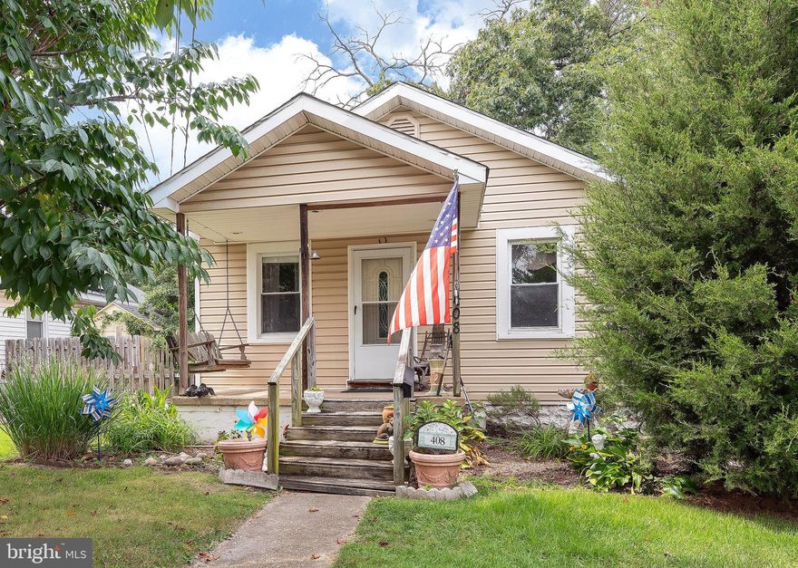 This charming & cozy ranch-style home is move-in ready! Whether you're a first time homebuyer, looking to upgrade to a detached home or downsizing, this home is perfect. A front porch welcomes you into an open floor plan with a living room boasting ample windows for lots of natural lighting, dining area with lighted ceiling fan and a kitchen with beautiful oak cabinets, lots of counterspace, gas stove and another lighted ceiling fan. The primary bedroom  is spacious with a walk-in closet, vaulted ceiling and sliding door to the deck. A second bedroom offers space which can be used for both bedroom and office. Nearby the bedrooms is the bathroom offering a large vanity, oak cabinet with plenty of drawers and storage. Completing this main level is a laundry area with full size washer and dryer.  With easy access from the kitchen, the wrap around deck and large backyard offer plenty of space to entertain family & friends. Don't miss out on this lovely home, conveniently located near ample shopping, dining and major highways.
