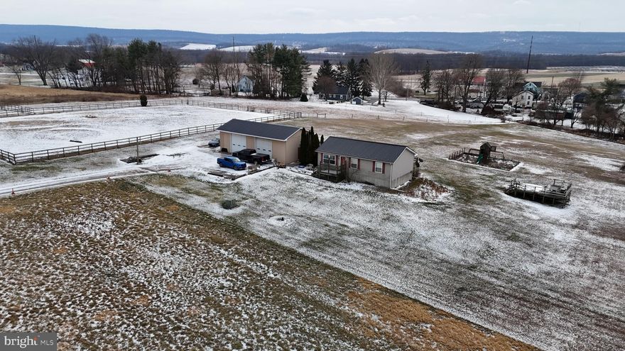 2.5 acre property with a 3 bedroom ranch home, located in a peaceful country setting and bordered by open farmland for added privacy and views. This home offers comfortable one floor living with a spacious layout, abundant natural light and room to grow. Outdoors, you will find a large level backyard, perfect for gatherings, gardening or simply enjoying the quiet surroundings, 24'x48' detached garage, complete with two oversized overhead doors, ideal for the car enthusiasts, equipment storage, a workshop or small business needs. This property can be purchased with an additional 15 acre horse farm.