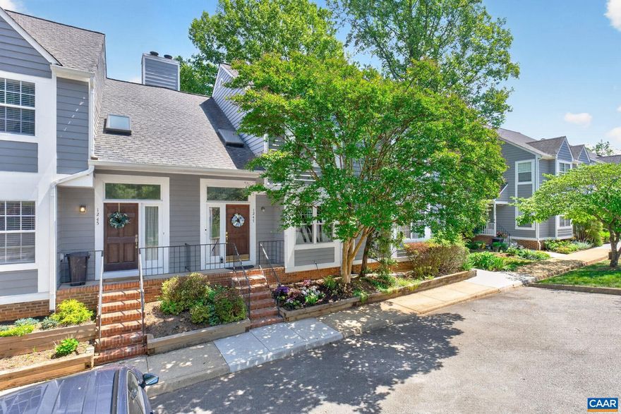 Bright, freshly painted townhouse minutes to town with Carter Mountain views! Extensive trails, tennis and softball close by at Monticello, PVCC, Monticello High School, Biscuit Run. Easy access to 64 and Downtown Charlottesville. Two story foyer opens to a kitchen with pantry closet and stainless appliances. Open living/dining area with hardwood floors, wood burning fireplace, and screened patio doors that open to elevated deck with beautiful views. Two upper level bedroom en suites complete with dual sink vanities and tub/showers. The primary suite features a vaulted ceiling and walk-in closet plus extra shelving for linens. Walk out lower level rec room with 2nd wood burning fireplace. Laundry room, unfinished storage/workshop area and under stairs storage. Expand the half bath to a full and the lower level could be a third bedroom option. Step outside to patio and small grassy area. Willow Lake is a convenient, quiet townhome neighborhood with a community lake.,Cutting Board,Formica Counter,Painted Cabinets,Fireplace in Den,Fireplace in Living Room