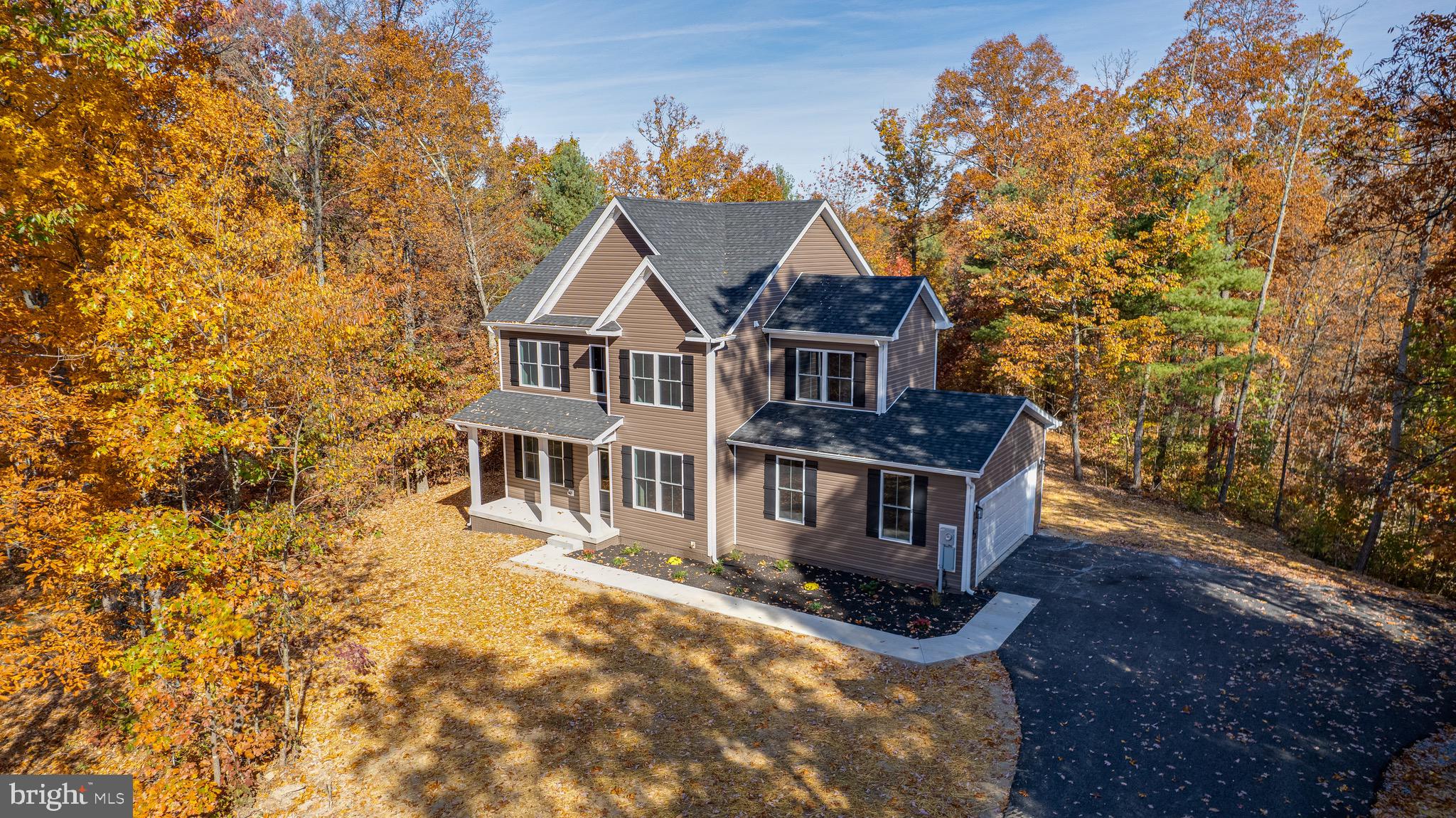 Inwood, WV - Stunning 4-Bedroom Home with Modern Amenities!
Welcome to your dream home! This beautiful property features:
4 Spacious Bedrooms and 2 1/2 Baths
Soaring 9-Foot Ceilings on the main level
Gourmet kitchen with Quartz Countertops, an inviting Kitchen Island, and 42-Inch Cabinets
Upgraded kitchen appliances perfect for culinary enthusiasts
Convenient Bedroom-Level Laundry
Luxurious His and Her Closets in the primary bedroom
Bedrooms 2 and 3 feature Walk-In Closets for ample storage
Elegant Luxury Vinyl Plank Flooring throughout both finished levels
Unfinished Walk-Up Basement with rough-in for future bath—ideal for customization!
Charming Front Porch and a spacious Rear Deck—perfect for outdoor relaxation
2-Car Garage with opener and a paved driveway for easy access
Partially cleared lot with mature trees, offering both privacy and a beautiful natural setting
Don’t miss out on this incredible opportunity! Schedule a tour today and envision your new life in this stunning home.