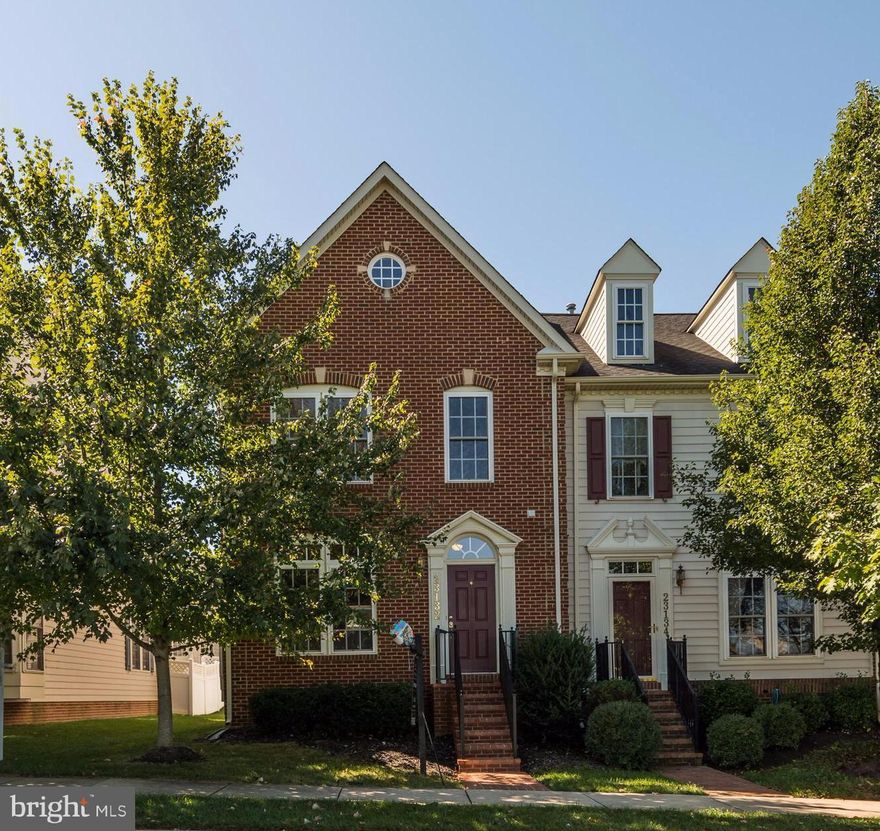 Brick Front End-Unit w/ 2-Car Garage. Spacious & Bright this Townhome offers New-Hardwood Floors-Carpet-Paint-Granite Counters,  Open Floor Plan, High Ceilings, Great Room w/Gas Fireplace, Open Kitchen w/Island, Luxurious Master Suite & Bath w/Soaking Tub, Sep Shower, Finished Lower Level w/Full Bath, Fenced Rear Yard, Large 2-Car Gar w/window. Community Pool & Clubhouse.