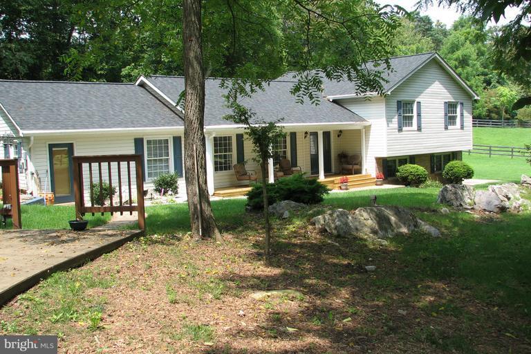 This horse lovers property offers its new owners all the right things! A 4 Bed 4 Full Bath home w/ many recent upgrades. Great commuter location for easy access to VA, MD & DC. 10+ acres is secluded & offers a peaceful private setting yet close enough to amenities. A 80x32 barn offers 11 stalls, wash bay, tack rm, hay loft, ceiling fans, full bath, fenced paddocks & much more. MOTIVATED SELLER