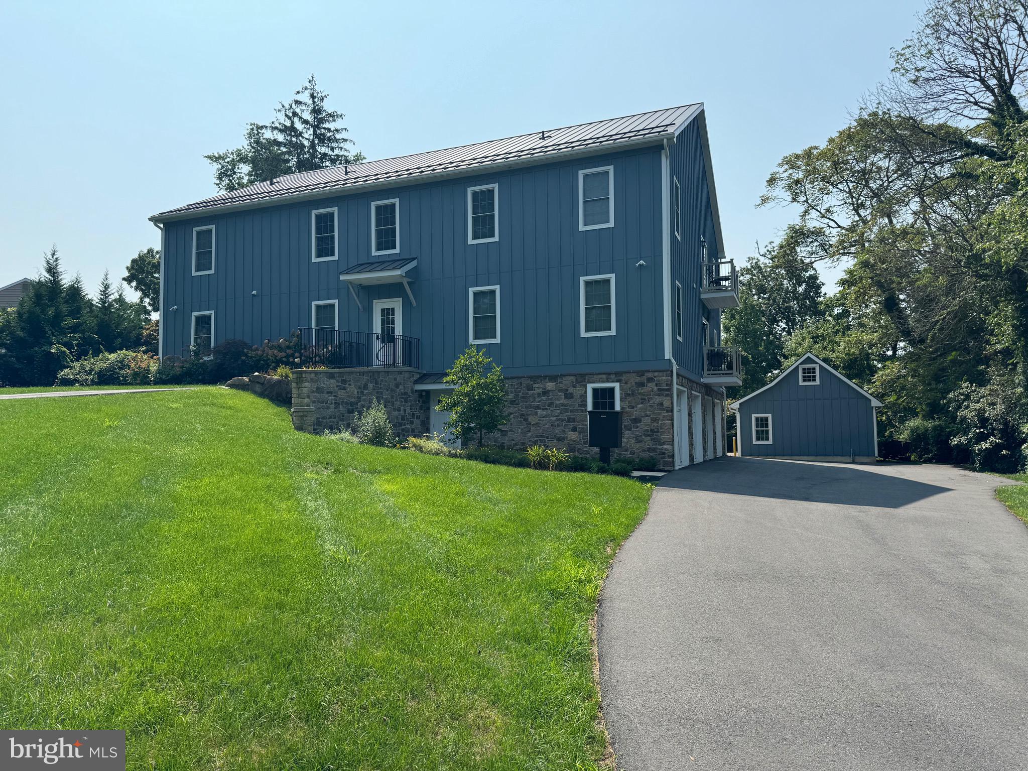 "The Barn at Edgeboro" 7 unit bank barn style with all of the modern amenities including 9' ceilings, beautiful quartz counter kitchens, Shaker style soft close cabinetry, ceramic tile bath, custom lighting and barn plank easy to clean vinyl flooring; Unit #2 (788sf plus separate private laundry room in lower level) features 2 bedrooms and 1 full bath with tub/shower; elegant kitchen with quartz countertop, and stone backsplash; vaulted ceiling in the living area and private balcony to enjoy the fresh air. This unit includes a one car garage (accessible without leaving the building) and is prewired should electric car charging be needed; a truly unique location just two blocks from the center of Historic Newtown Borough, one block from the Newtown Movie Theatre, within 5 minutes of Tyler State Park and Core Creek Park; convenient to major routes I-295, Route 1 and the PA Turnpike as well as shopping centers, restaurants, etc all within walking distance; Make the Barn at Edgeboro your home in the middle of it all! NO PETS; NO SHORT TERM LEASES.