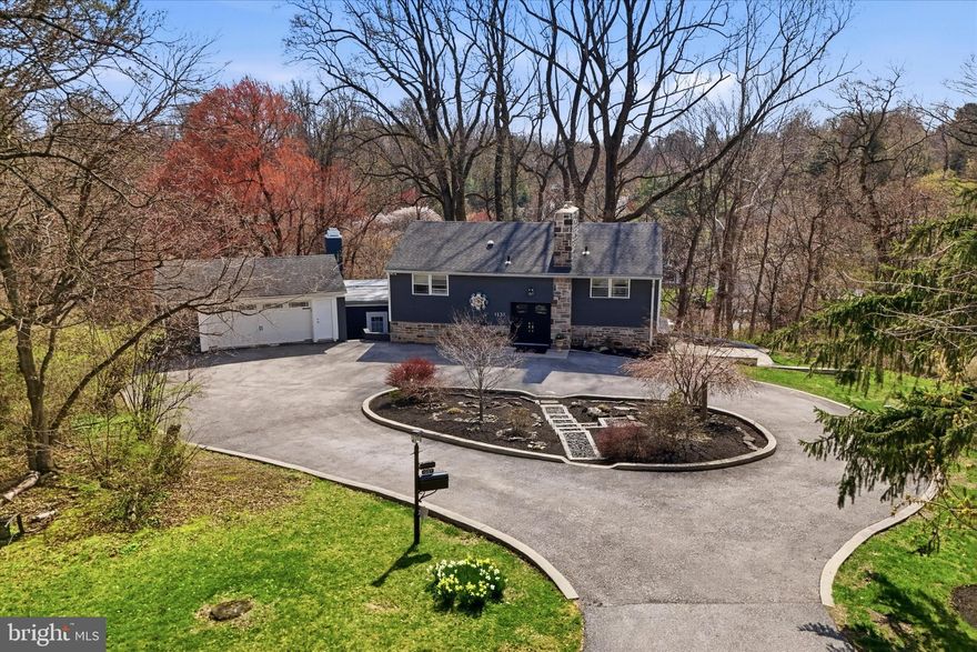 Set on landscaped grounds, this home offers a serene, private setting at the end of a long drive and provides a peaceful escape on over an acre in the heart of Penn Valley and the highly sought-after Lower Merion School District. This 3-bedroom plus den, 2.5-bath home offers the perfect combination of comfort & luxury with sought-after Main Line conveniences, and is walking distance to school and places of worship and has easy Center City access.
The spacious and functional layout is designed for everyday living and seamless indoor/outdoor entertaining. The home offers beautiful tree-top views and sunlight fills the main living areas, creating a warm and inviting home.
The show stopping kitchen is the heart of this home,  complete with a large seated island, a coffee nook and wine bar with wine refrigerator, custom cabinetry, and generous prep space, as well as a huge walk-in pantry.  High-end stainless steel appliances including cooktop with griddle and professional hood, double wall ovens, convection microwave and warming drawer will please the most discerning chef.  A side-by-side Sub-Zero refrigerator and freezer makes for an abundance of storage for all of your entertaining needs.  All opening seamlessly to the dining room and the family room with sliding glass doors opening to the screened porch & back yard. An inviting den is tucked off the family room- with built-in bookshelves and a gas fireplace-  It's the perfect work from home space or a cozy place to curl up with a good book. Additional flexible living spaces include a separate gym area, which would make a great home office as well, perfect for today’s work-from-home and wellness-focused lifestyles. Whether you need space for productivity or recreation, this home delivers versatility to meet your needs.The laundry room as well as the convenient powder room and separate mudroom entry complete this level.
Upstairs, the large primary suite offers a true retreat, complete with a luxurious en-suite bath with double vanities, an oversized shower with dual shower heads and benches and an enormous custom outfitted  walk-in closet with island storage. Two additional well-sized bedrooms share a beautifully appointed hall bath with dual sink vanity & shower/tub combo with eye catching tile work throughout. 
The home offers indoor/outdoor seamless living with the screened-in porch that spans the length of the main level, and the paver patios and hot tub are in the perfect tranquil backdrop for relaxing or entertaining.  Enjoy the covered porch or the large outdoor patio with BBQ, or soak in the hot tub and take in the peaceful surroundings. 
Just minutes from Center City Philadelphia, major roadways, and top-rated Lower Merion schools, this Penn Valley home offers indoor/outdoor living with luxury finishes. A wonderful opportunity to own in one of the Main Line’s most desirable communities with all the conveniences of the Main Line, shopping, dining and more.  Enjoy close proximity to center city Philadelphia and the close proximity of the train.