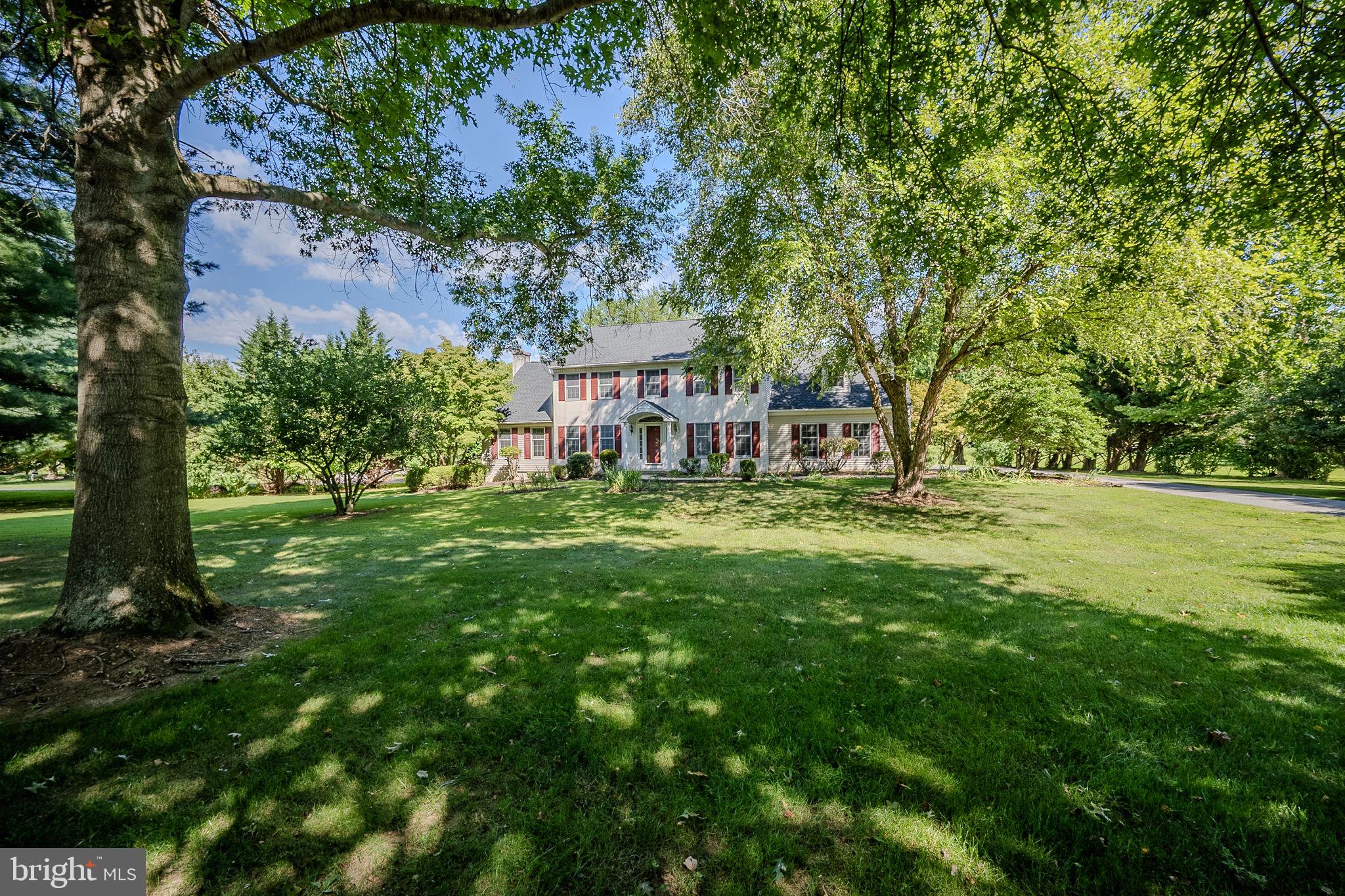 Welcome to 148 Stonegate Drive in the prestigious and bucolic community of Stonegate. Sitting on a private and peaceful 1.1 acre property, this elegant and expansive home has everything! Step inside to a grand two-story foyer with hardwood floors and the formal living & dining rooms on either side featuring beautiful moldings and abundant natural light. Flow into the open main living space joining the spacious kitchen, eating area, and the great room with floor-to-ceiling stone fireplace and a view of nature from each space. This kitchen is bright & spacious with 42-inch cherry cabinets with glass pane accents and undermount lighting, center island with seating, and convenient desk and coffee bar area. From the main living space, atrium doors lead outside to the deck and tranquil back yard, surrounded by nature and the perfect place to relax, dine, entertain, and appreciate the changing seasons in this home. Back inside and completing the main level is a powder room for guests and a large laundry/mudroom with storage space and access outside. Upstairs, you will find all 4 bedrooms and 2 full baths, including the primary suite with tray ceiling, large walk-in closet, and large primary bath with double vanity, soaking tub, and glass shower. The massive basement is unfinished and offers endless possibilities to finish as your dream entertainment space or whatever your needs require. Situated on a gorgeous property within the Avon Grove School District and located close to everything this area has to offer. Be sure to view the virtual tour and schedule a showing today!