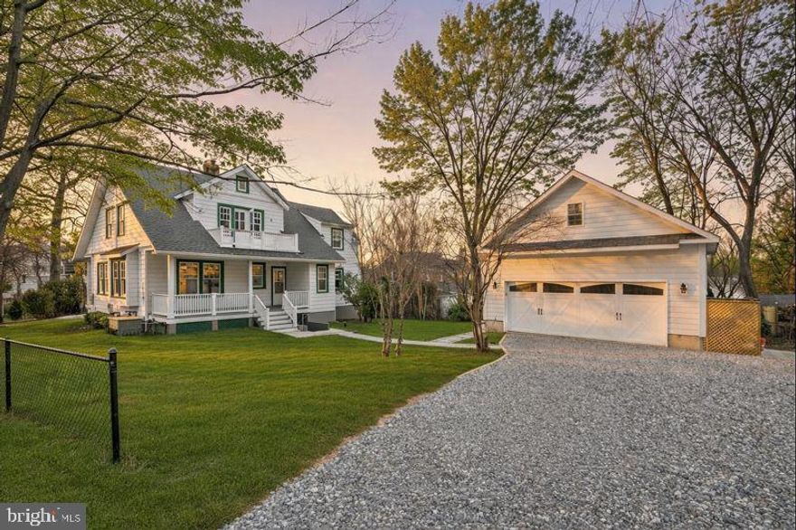This one is a masterpiece. Set on a classic Silver Spring street, 9403 Warren St is an impeccably restored historic bungalow expanded with a seamless addition and finished to a level you rarely see, all in keeping with the Historic guidelines. No details were spared, with all original components either restored, or masterfully matched. The restoration pairs timeless character with peace of mind thanks to a new roof, true divided light insulated windows for both the highest quality and craftsmanship to match the original design, all-new mechanical systems, all new appliances, and even a whole home generator. Inside, the original charm takes center stage with restored hardwood floors, rich trim work, a showcase fireplace, and carefully revived period details, complemented by curated lighting and hardware that feel authentic to the home’s era, while at the same time boasting top of the line modern conveniences, like wireless Lutron and Skylink 3 way switches. The updated kitchen is both striking and functional, featuring ceiling-height cabinetry, a rare and stunning quartz that matches the exterior trim color to the vein of the stone, a farmhouse sink, and a stainless range with a statement vent hood, all designed to flow naturally into everyday living and entertaining spaces. The main level powder room boasts a hand carved vanity that will leave you speechless. The addition, perfectly matching the original home, provides an exquisite living area on the main level and an incredible primary suite up top. The home features 4 bedrooms and 3.5 baths across a thoughtful layout, while a dedicated office or nursery adds flexibility for work or a quiet retreat.  
The lower-level suite, with a bedroom and full bath creates excellent options for guests, extended stays, or a separate rental income capability. The walkout lower level offers a separate entrance and even a dedicated wine room, complete with handmade wine rack, top of line wine fridge, and a full size laundry room. Outside, the porches deliver the kind of curb appeal that never goes out of style. The detached 2-car garage is a standout with built-in shelving and space for cars and projects, plus a large driveway for expanded parking, all on a charming corner lot. Just over the DC line, the location is amazing, giving you access to the best Washington DC has to offer, minutes to Forest Glen Metro, and close to I-495 for easy commuting. This special property is truly a one of a kind. Make this your home today!
