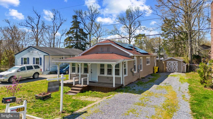 Welcome to 5612 Essex St, a charming coastal retreat nestled in the heart of Churchton! This beautifully updated and maintained home offers the perfect blend of comfort and convenience, just STEPS from the Chesapeake Bay! Featuring 2 spacious bedrooms, 2 updated full bathrooms, and an open-concept living area,  boasting a beautifully updated kitchen with stainless steel appliances, granite countertops, and plenty of natural light. This home is ideal for relaxing or entertaining. Step outside to a fully fenced backyard with a brand new, large back deck—perfect for summer BBQs and evening sunsets. There is a large detached shed that has a workshop on one side and a relaxing semi-finished section on the other side. Located on a quiet street with easy access to marinas, local dining, and major commuter routes, this home is a true gem in a water-privileged community with recreational amenities and beautiful waterfront walks! Don't miss the opportunity to live the bay lifestyle year-round! HVAC - 1 year old, Well Pump - 3 years old, Water Heater - 4 years old, New floors throughout. Shed sold as-is.