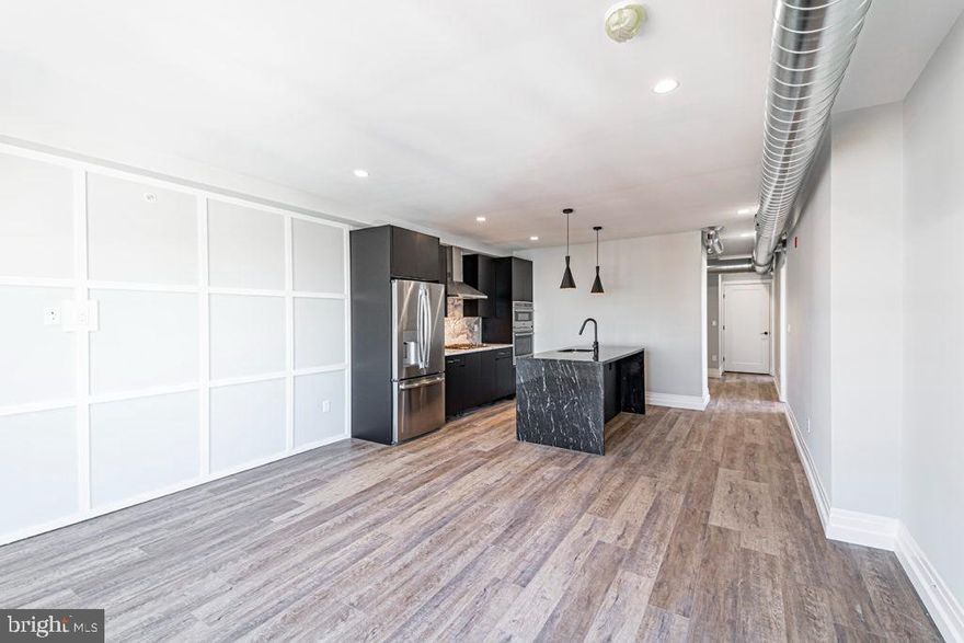 *Available 7/1!*

Luxury doesn’t even begin to describe the sparkling apartments at Hudson Liberties that feature high end finishes and unique style unlike anything else on the market. Upon entering this 2 bedroom, 2 full bathroom 941 sq ft unit, you’ll take in an unobstructed view of the Center City skyline. A decorative wall of floor to ceiling wainscoting gives this space a classy and timeless look. The massive living room flows into the kitchen, where no expense was spared. Stark contrast of black and white granite counter tops, back splash and island with a waterfall edge features designer lighting above that reflects the copper glow on its surface. Complete with Danze kitchen fixtures and top of the line GE appliance package: dishwasher, refrigerator, gas stove top with gourmet range hood, wall microwave and oven combination. Off the kitchen is the primary bedroom with a walk-in closet, en-suite bathroom with European bath finishes, a double vanity sink, and glass shower with modern tiles and two shower heads. The bedroom is spacious and offers more of those stunning skyline views. On the other side of the unit is another bright bedroom with a deep closet, washer/dryer in the hallway, a large coat closet near the entryway and second full bathroom identical in finishes and design to the first, but with a deep soaking tub.

You will enjoy this premium location at 526 Brown St that is just steps from local restaurants like Federal Donuts and Honey’s Sit N Eat, as well as four blocks to the entire 2nd St Commercial Corridor, five blocks to the Spring Garden Subway Station and offers quick access to I-95 for zipping in and out of the city. All tenants have access to additional amenities including secure bicycle parking, a designated storage locker, and a 2,000 sq ft shared roof deck that offers panoramic views of the Center City skyline. The building also has a state of the art access control system with security monitoring.

Lease Terms: Generally, 1st month, and 1-month security deposit due at, or prior to, lease signing. Other terms may be required by Landlord such as last month’s rent upfront. $65 application fee per applicant. Tenants are responsible for: electricity, gas (if applicable), cable/internet. Water is a flat monthly fee of $75. Additional fees or requirements may be applicable for units with Homeowners or Condo Associations.  Landlord Requirements: Applicants to make 3x the monthly rent in verifiable gross income, credit history to be considered, have no evictions within the past 5 years, and must have a verifiable rental history with on-time rental payments. Exceptions to these criteria may exist under the law and will be considered. Cosigners will be considered.

*1 cat permitted with owner approval, $350 non-refundable pet fee required.
*Small dogs under 35 lbs permitted with owner approval, $50/mo pet rent required.