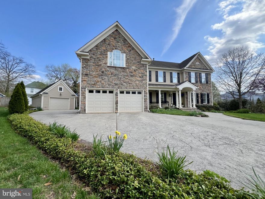 Coming soon.....Custom-built by renowned Quaker Homes, this exceptional Colton model showcases timeless design and quality craftsmanship throughout. Nestled on a quiet cul-de-sac, the home features a striking stone front and inviting front porch.

Inside, you’ll find a thoughtfully designed layout with a main-level en-suite bedroom, perfect for guests or multigenerational living. The gourmet kitchen is a chef’s dream, complete with double dishwashers, a walk-in pantry, and high-end finishes, flowing seamlessly into living spaces highlighted by a cozy gas fireplace, custom millwork, tall ceilings, and beautiful hardwood floors.

Upstairs offers four spacious en-suite bedrooms, providing comfort and privacy for all. The main level also includes a large private office, ideal for today’s work-from-home lifestyle.

The fully finished walk-up basement expands your living space with a second full kitchen, media room, two additional bedrooms, and a full bath—perfect for entertaining or extended stays.

Step outside to a stunningly landscaped, lush, and private backyard with a full sprinkler system, along with a custom-built detached two-car garage. Lovingly maintained by the original owners, this home is a rare blend of luxury, functionality, and elegance. This home offers an expansive muti-generational floor plan.

Located on the highly sought-after Historic Town of Herndon with ample parking and picturesque brick sidewalks, ideal for evening strolls through Downtown Herndon. Enjoy the convenience of being just steps from renowned local dining, entertainment, and cultural hotspots, including Aslin Beer Co, the famous Jimmy’s, Herndon Arts Center, the library, and the W&OD Trail. With a Walk Score of 82, this exceptional location is a paradise for walkers and cyclists alike