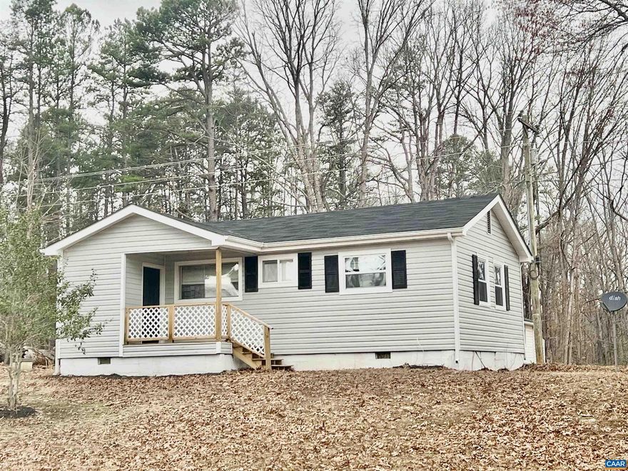 Move In Ready And AFFORDABLE...2025 Improvements: New Roof, Windows, Vinyl Siding, Large Deck, and Driveway all Installed 2025...INTERIOR Just PAINTED (New Pics to Come)... 10 Minutes to 64/Zions Crossroads, 20 Minutes to Charlottesville, Potential Rental Income as only 10 Minutes to Keswick Vineyards, 4 Miles to Merrie Mill Vineyard..Large Flat 3 acre Lot... Bright Living room with Gleaming HARDWOOD Floors, Big Picture Window Overlooking the Front Porch. 2 Bedrooms with Wood Floors and 1 Full Bath, Outside Storage Building Has Electric for a Workshop!