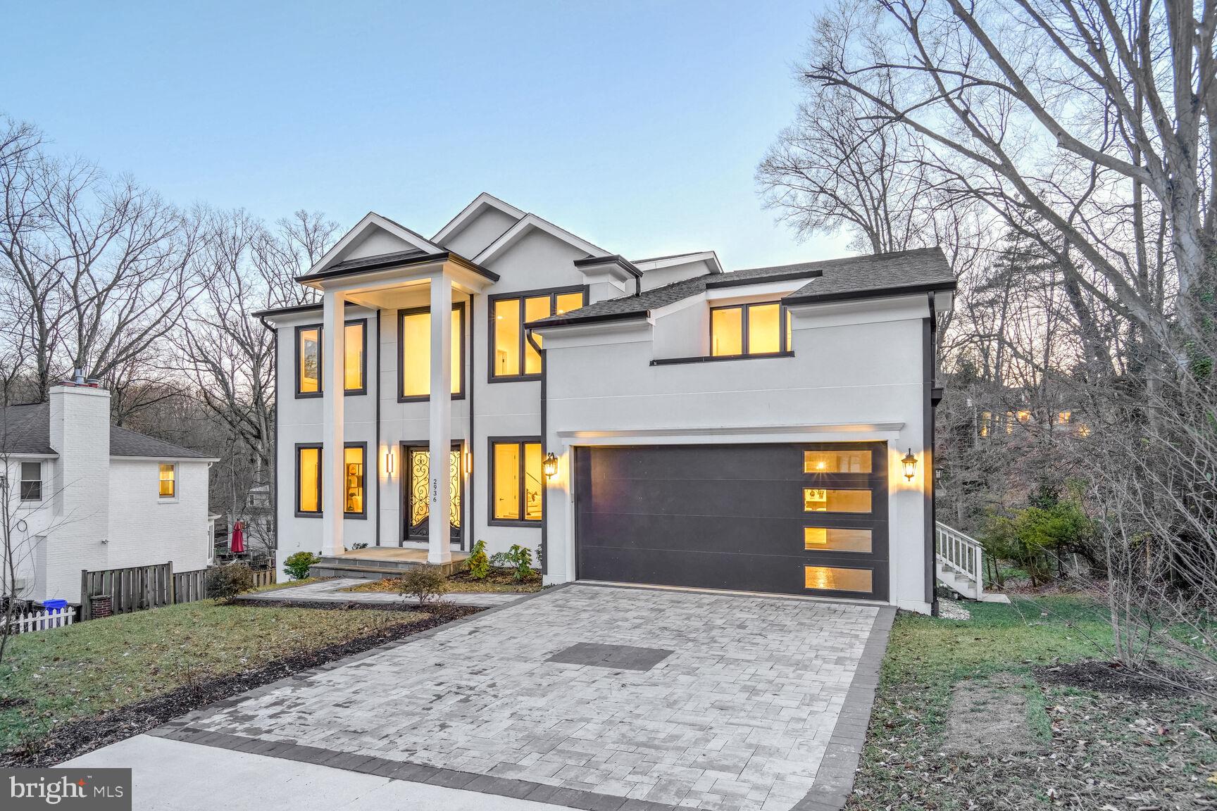 Brand new to Bellevue Forest, this stunning modern home is waiting for it’s new owner. This new construction, built by MASS Construction, offers the finest in luxury living. As you enter the expansive contemporary floorplan, the high ceilings and large windows brings you together with nature. The interior finishes of the home are exquisite. Hardwood floors run throughout the living spaces, complemented by elegant custom finishes that add sophistication to each room. The kitchen boasts top-of-the-line stainless steel appliances, sleek quartz countertops, a separate bar area and a spacious island that serves as both a culinary workspace and a gathering spot for family and friends. Modern cabinetry with a minimalist design provides ample storage while maintaining a clean aesthetic. The kitchen-family room combination features a contemporary marble fireplace, perfect for cozy evenings, with a sunroom that enhances the outside space. Minutes to Washington, DC and all the amenities of Arlington, you can’t beat this location!