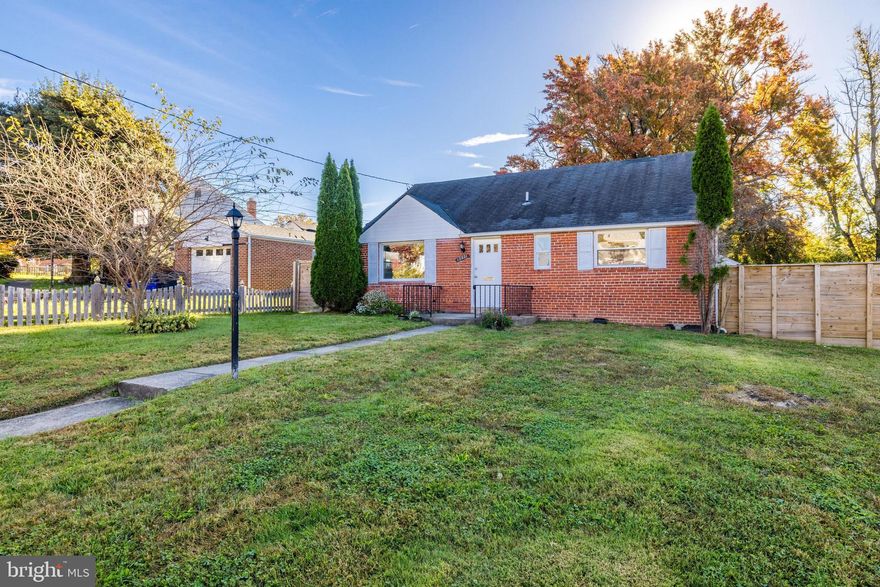 Charming rambler with basement 1/3 mile to the Glenmont Metro. Updated kitchen and bathroom, great rear screened in porch and fenced rear yard and patio! Lower Level Recreation Room, bedroom/office/den and full bathroom.  Fresh paint throughout * Hardwood floors on the main level.  Great space, yard and location!