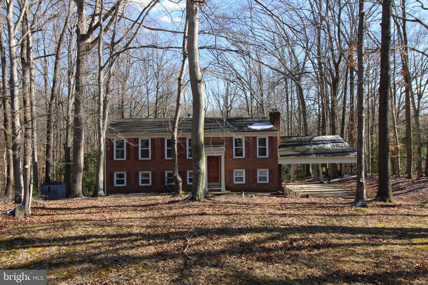 Desirable split-foyer residence on wooded lot presents an excellent opportunity for the discerning homeowner or real estate investor. Property features recent upgrades including electrical panel, windows, HVAC system, and water heater, all updated within the past five years. Roof shingles replaced in 2015. This property offers potential for personalization and immediate occupancy with minimal initial renovation required. An ideal candidate for those seeking a turnkey investment or a customizable living space.