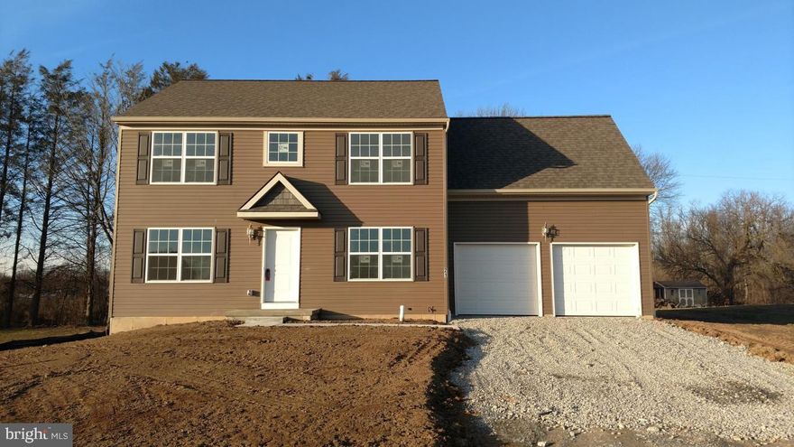 BEING BUILT IN HEMPFIELD SCHOOL DISTRICT IS THIS 3 BDRM 2.5 BATH 2 STORY ON BEAUTIFUL COUNTRY LOT*LARGE OPEN KITCHEN, SOLID WOOD CABINETS WITH CROWN MOLDING*HARDWOOD FLOORS IN FOYER*BRIGHT OPEN FLOWING FLOOR PLAN TO FAMILY RM, BULLNOSE CORNER DRYWALL ON 1ST FLR*MASTER BDRM WITH VAULTED CEILING AND HUGE WALK IN CLOSET*12 x 14 DECK* POURED CONCRETE WALLS AND 30 YEAR ROOF. STILL TIME TO CHOOSE YOUR COLORS AND YOUR UPGRADES!!