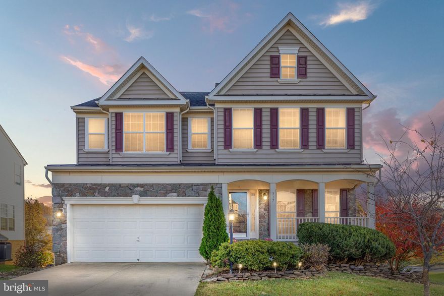 Welcome to this beautiful 4-bedroom, 3.5-bath Colonial in Martinsburg! Set on a .23-acre fenced lot, this home welcomes you with a charming stone and siding exterior and a lovely front porch. Inside, the gourmet kitchen boasts granite countertops, a spacious island, stainless steel appliances, and a double wall oven—ideal for cooking and entertaining. The kitchen flows into the spacious family room, where a stunning stone fireplace adds ambiance. The main level also features a living room, formal dining room and half bathroom.

Upstairs, the primary suite offers a tray ceiling and a luxurious bath with designer tile, a whirlpool tub, and separate shower. Three additional bedrooms and a convenient laundry room complete the upper level, providing ample space and functionality.

Downstairs, the finished rec room with a full bath in the walkout basement offers flexible space for a home office, gym, or hobby area. There is also additional unfinished space for storage or future customization. Outside, enjoy the fenced backyard and deck, perfect for gatherings and relaxation.

With a spacious 2-car garage, a new HVAC system installed in 2023, Hot Water Heater in 2020 and updated kitchen appliances, this home combines style, functionality, and comfort in an ideal location!