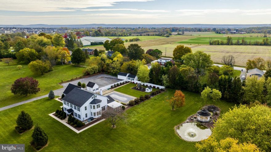 Live your life on vacation! 

Spanning over 4,700 square feet of finished living space, this stunning Colonial in the heart of Frederick boasts a spacious layout that caters to both comfort and functionality. As you step inside, you'll be greeted by the warmth of Brazilian cherry hardwood floors that flow seamlessly throughout the main level.

The heart of this home is undoubtedly the gourmet kitchen featuring stainless steel appliances, stone countertops, and a convenient walk-in pantry. Whether you're hosting a dinner party or enjoying a casual meal with family, the formal dining room and living room provide ample space for all your entertaining needs.

RELAX in the sunroom overlooking the backyard with breathtaking views of Sugarloaf Mountain. The outdoor oasis also includes an inviting in-ground pool surrounded by lush landscaping, perfect for those hot summer days. Additionally, there's a pond with a tranquil waterfall and gazebo where you can unwind amidst nature's beauty.

Retreat to the large master bedroom suite complete with his and her closets, as well as an ensuite bathroom featuring a separate jetted tub and walk-in shower. The additional bedrooms are generously sized and offer plenty of natural light along with ample closet space.

Entertainment options abound in this remarkable property! The lower level features a bonus built-in playhouse that will surely delight children of all ages. For outdoor gatherings or simply enjoying some fresh air, there's a sizable screened-in porch with mountain views and a large patio accentuating the meticulously landscaped yard.  HVAC was confirmed 2020!

This home is equipped with modern amenities, including four gas fireplaces for cozy evenings, central heating and cooling systems to keep you comfortable year-round, and a laundry room for added convenience. The double-pane windows and skylights allow natural light to flood the interior while maintaining energy efficiency.

Situated on a sprawling 2.35-acre lot, this property offers privacy and tranquility. With off-street parking available for up to 15 vehicles, there's plenty of space for guests or storing your recreational vehicles.

Conveniently located in Frederick, MD, you'll have easy access to shopping centers, dining options, parks, and major highways. This prime location ensures that everything you need is just a short drive away.

Don't miss out on the opportunity to own this exceptional colonial-style home in Frederick! Contact us today to schedule a private viewing and experience the epitome of luxury living.