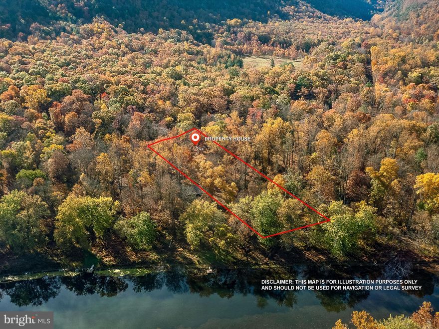 Discover the perfect oasis in the heart of Great Cacapon, WV, at 706 Briary Bottom Lane. Nestled in the embrace of West Virginia's countryside, this property offers a serene retreat for those seeking a peaceful escape.
Nestled in the serene landscapes of Great Cacapon, this property provides a haven for relaxation amidst the natural beauty of the region. With its close proximity to the Cacapon River, you can savor the soothing sounds of running water and take in the picturesque surroundings. This charming cabin greets you with warmth and character. Step inside to find a cozy and functional space that's perfect for a primary residence or a tranquil getaway. The well-equipped kitchen provides a view of the river, and  an ideal space for whipping up meals to enjoy on the outdoor deck or to fuel your adventures. The home offers 2-comfortable bedrooms that provide a restful retreat. Wake up to the tranquility of your surroundings, ready to embrace a day filled with outdoor adventures. Step outside to an expansive yard, surrounded by lush greenery that leads you to the river's edge. This is your canvas for outdoor activities, gardening, or simply unwinding in nature's embrace. It's an excellent spot for gatherings with loved ones, barbecues, or picnics. For water enthusiasts, the Cacapon River access is a significant asset. Kayaking and exploring the river's serene waters become a part of your lifestyle, allowing you to connect with nature in a unique and adventurous way. While nestled in nature, you're not far from local amenities in Great Cacapon and Berkeley Springs. This property seamlessly blends the charm of rural living with the convenience of easy access to the essentials.
706 Briary Bottom Lane is a serene and scenic retreat that beckons you to unwind and embrace the natural beauty of the area. If you're seeking a peaceful escape with river access and the opportunity for outdoor adventures, this property is a must-see. Contact us today to arrange a visit and experience the tranquility of this captivating home.