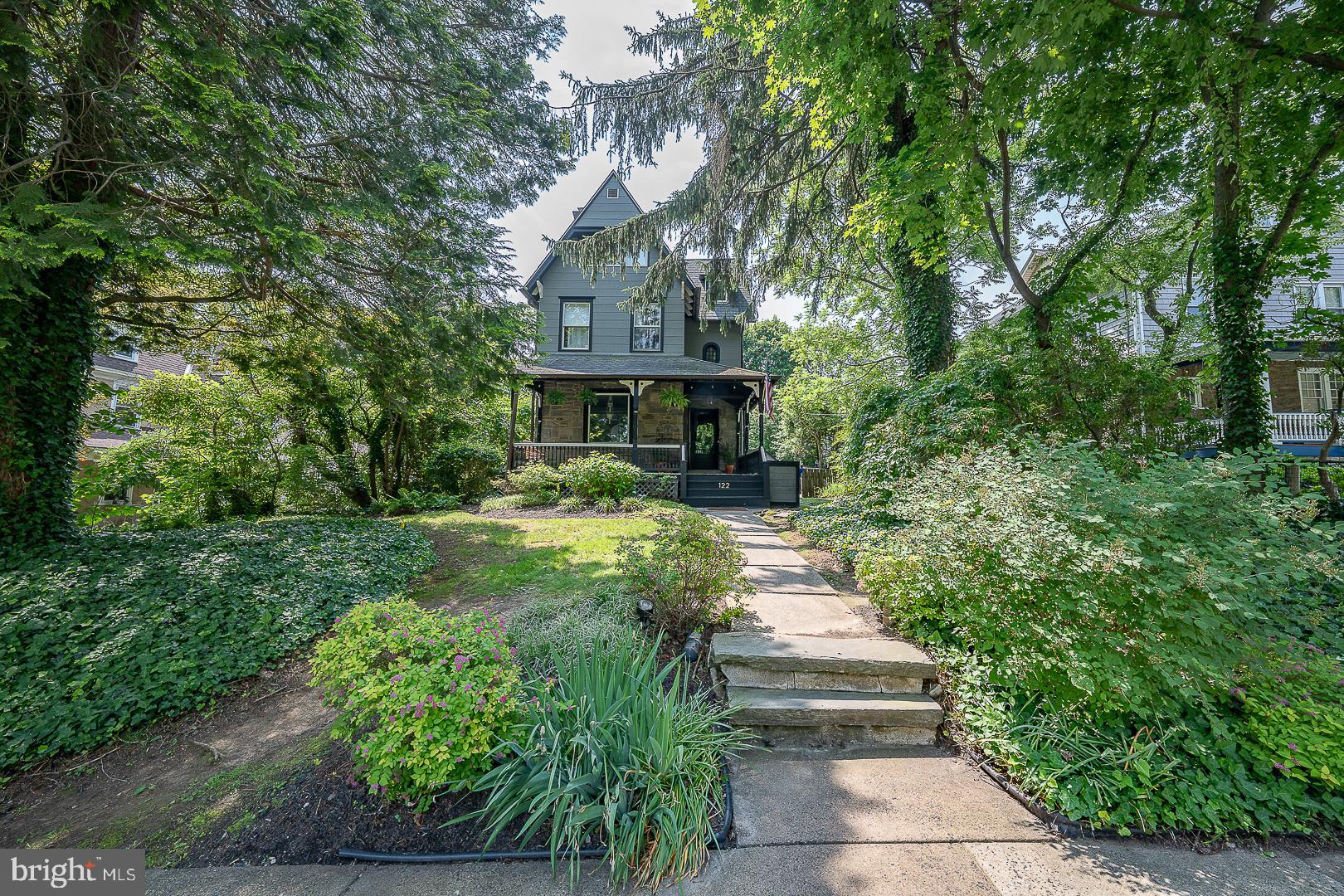 "Welcome to 122 Webster Avenue, a charming classic Victorian residence in the heart of Wyncote, Pennsylvania. This delightful home seamlessly blends historic charm with modern updates, featuring a welcoming front porch that adds to its character. Step inside to find hardwood floors throughout, high ceilings, and a cozy gas fireplace in the spacious living room. The beautifully remodeled kitchen is a chef's dream, showcasing sleek stainless steel appliances and a large kitchen island with sink—perfect for meal prep and casual dining. The elegant dining room boasts a stunning built-in cabinet, offering both beauty and functionality. A convenient first-floor powder room adds extra ease for guests. The second floor features 3 spacious bedrooms, large storage closet and remodeled bathroom. Upstairs, the third floor features a luxurious master suite with an ensuite bathroom and a bonus room providing a private retreat. Enjoy central air conditioning for year-round comfort, along with updated bathrooms and a finished basement offering extra living space. Step outside to your personal retreat, featuring a swimming pool, relaxing sauna, a deck with a built-in outdoor kitchen, and a two-car detached storage garage with access thru a shared driveway. Conveniently located within walking distance to the train, shopping, and schools, this home offers both comfort and accessibility. Make this Wyncote gem your own and enjoy elegance, convenience, and timeless charm. Don't miss this opportunity !