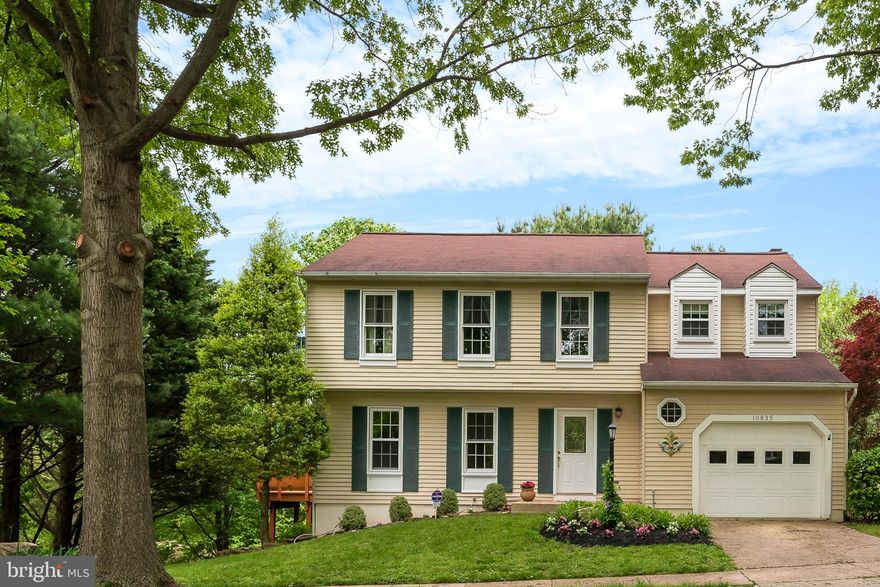 Beautiful home with all of the features and upgrades you've been dreaming of : Updated kitchen boasting breakfast bar, maple cabinets with under cabinet lighting, granite counter tops and sleek stainless steel appliances. Sunbathed family room with wood burning fireplace. Spacious Master Bedroom suite with hardwood flooring and custom walk in closet. Finished walk out lower level features recreation room with wet bar, full bath plus two additional rooms  ( one could serve as an excellent 5th bedroom ) .  Gleaming hardwood flooring  . Remodeled baths.  Recently replaced windows , sliding door, carpet, microwave, dishwasher, washerand dryer Expansive private deck overlooking a lovely fenced yard with a gorgeous view of the pond and trees. Great location- just minutes to Centennial Park, Columbia Town  Center and all major routes. Columbia out parcel, No cpra