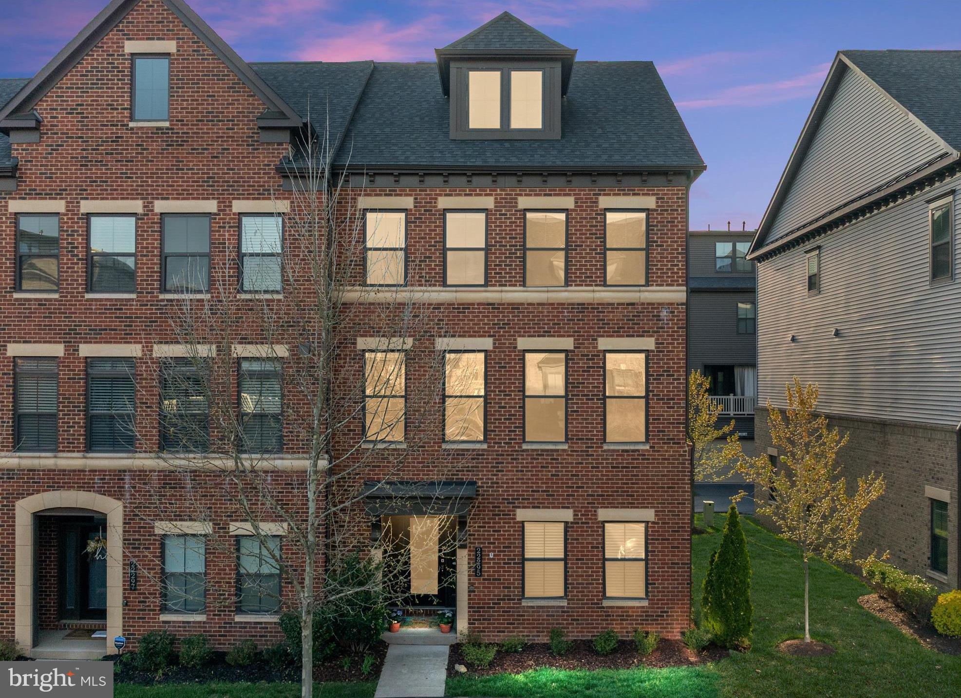 Welcome to Westmoore — where urban living meets modern luxury in Ashburn!
This stunning 4-level end-unit townhome offers convenient, lock-and-go living just minutes from the Silver Line Metro, dining, shopping, and entertainment. Enjoy vibrant indoor and outdoor spaces, plus access to plenty of community amenities.
As you enter, you're greeted by a spacious foyer and versatile recreation room—perfect for a cozy hangout, home office, or even an additional bedroom. A full bathroom and mudroom off the garage add convenience and extra storage.
Hardwood oak stairs lead you to the main level, you’ll find an open-concept layout featuring a sunlit living room, dining area, and gourmet kitchen. The kitchen boasts stainless steel appliances, granite countertops, sleek white shaker cabinets, a stunning glass tile backsplash, walk-in pantry, and engineered hardwood flooring. Step out onto the balcony off the dining room—ideal for morning coffee or relaxing evenings.
The third level features a spacious primary suite with three walk-in closets, a spa-inspired shower, and dual vanities. Two additional bedrooms, a full bath, and a convenient laundry room complete this floor.
Head up to the top level and you’ll discover a spacious loft—great as a second living area—a fourth bedroom with a sitting nook, another full bathroom, and the crown jewel: a private rooftop terrace, perfect for dining under the stars, entertaining friends, or starting your very own container garden.
The Westmoore community offers incredible amenities including two large parks with tot lots and a dog park, a clubhouse with a pool and fitness center, scenic walking/jogging trails, a catering kitchen, event-ready Great Room, pavilion, and outdoor grills.
Just minutes to the Metro, with easy access to Dulles Greenway, Dulles Airport, and major highways—this home is perfectly positioned for work, play, and everything in between.